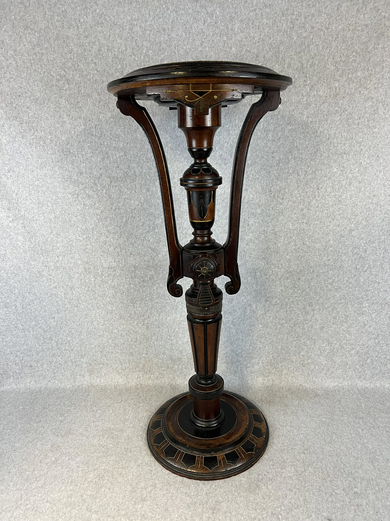 Antique 19th C Renaissance Revival /Aesthetic Movement Plant Stand: Antique circa 1870's walnut aesthetic movement / renaissance revival plant stand which retains its completely original ebonized and gold accent decoration along with its original felt top. Stand measu