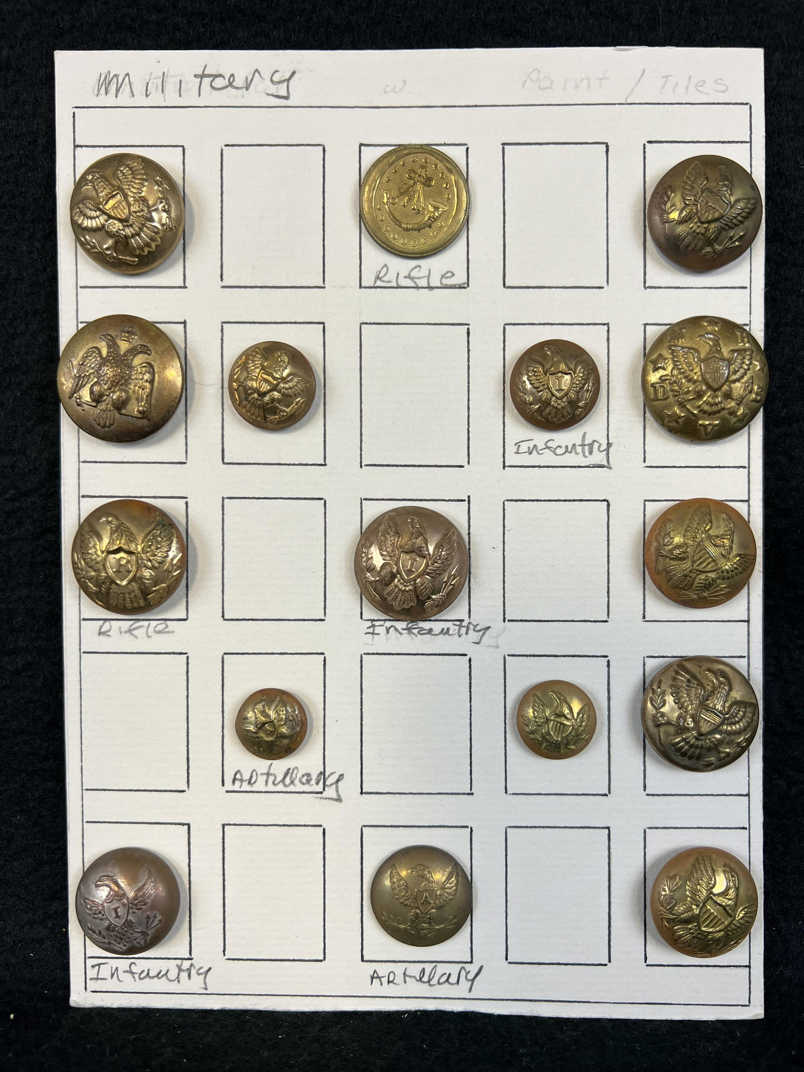 Lot Antique Military Uniform Buttons: A lot of antique military uniform buttons which include a pre Civil War rifleman button as well as some union Civil War buttons and some of later vintage.