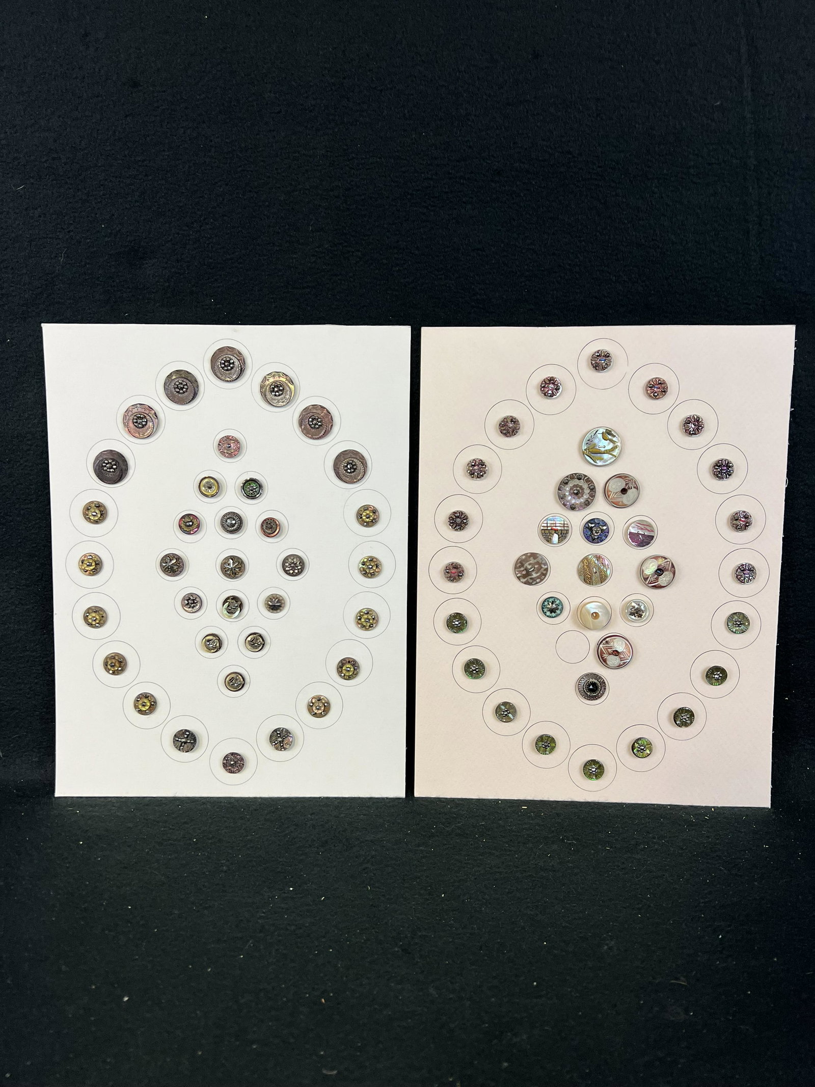 Lot 2 Cards Antique Mother Of Pearl Buttons Ecrusteons, Painted & Engraved: A lot of two cards of antique buttons made of mother of pearl decorated with engraving and painting and some with ecrusteon centers in fine condition.