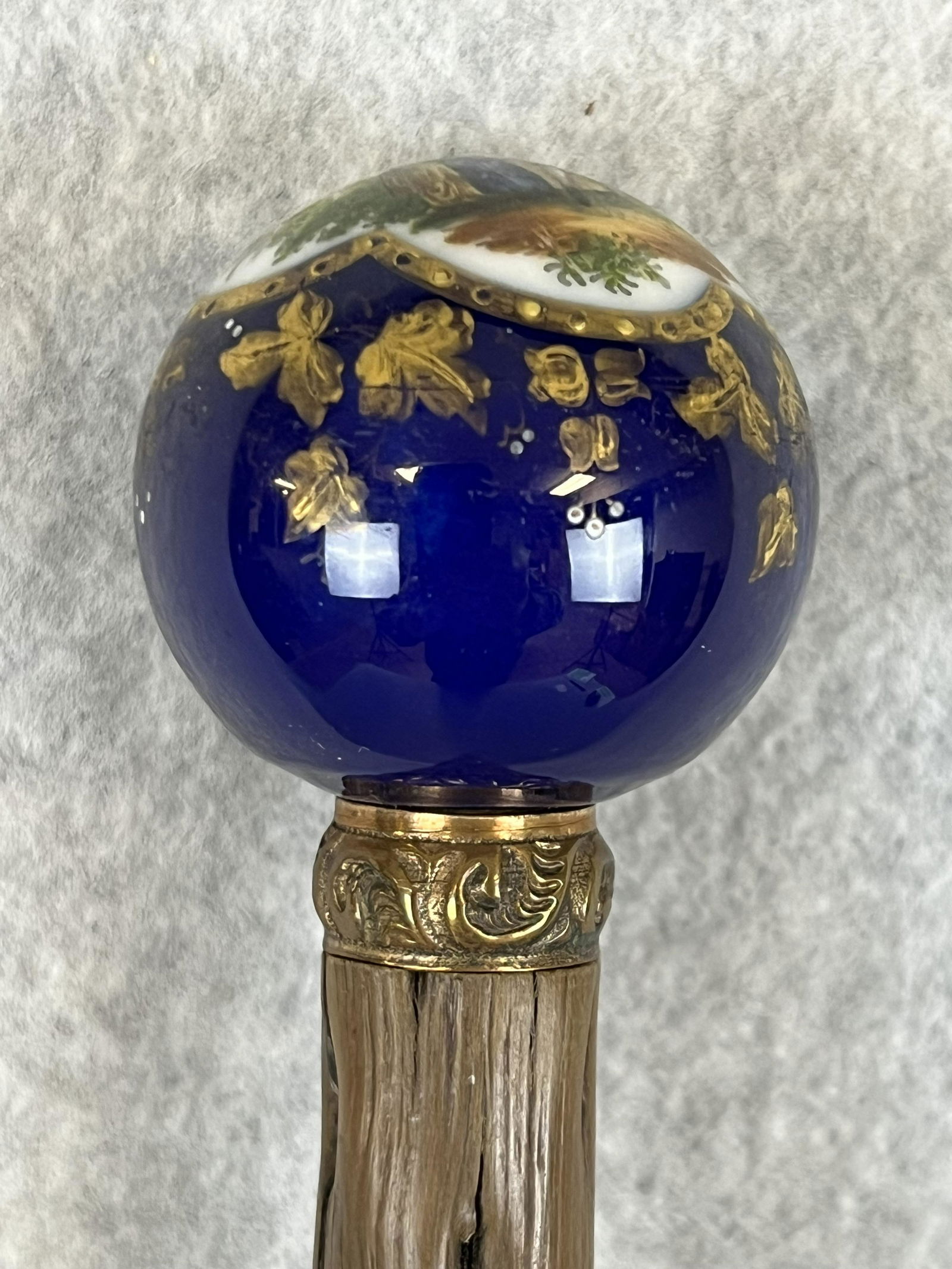 Antique Cane With Hand Painted Limoges Type Porcelain Handle / Top: Antique cane / walking stick which has a hand painted porcelain Limoges style handle / top mounted on a wooden shaft. The ball shaped top is approximately 1 1/2" in diameter and the cane measures appr