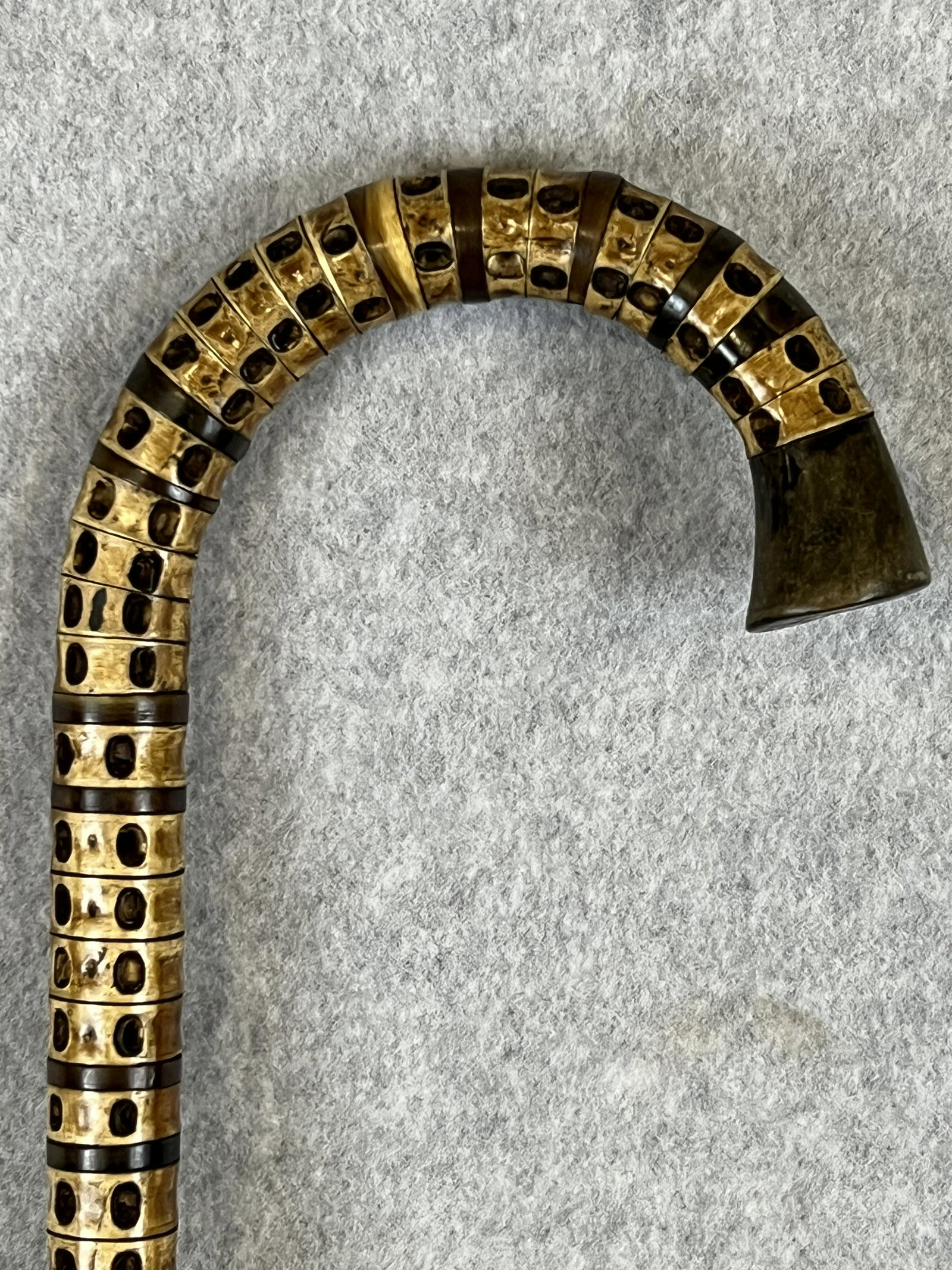 Presentation Shark Vertebrae Cane From Lt Gov Fernand Mouton of Louisiana: Dated 1932 presentation cane made of shark vertebrae which was presented by the Lt Gov of Louisiana Fernand Mouton (1878-1945)to Uncle Bob Smith. Cane has the presentation inscription on a gold band.