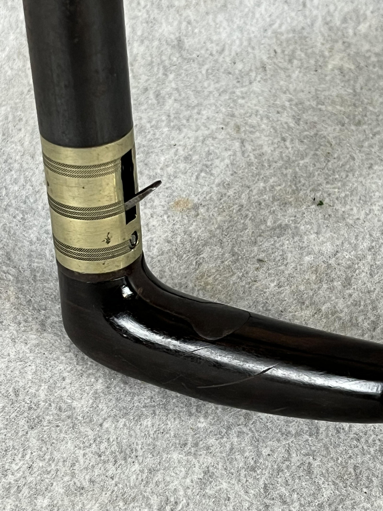 Antique 19th C Gun Cane: Antique 19th century gun cane consisting of a rosewood handle with German silver collar with a blued steel shaft. Steel shaft twists to reveal its breech which is marked 50 / 289. The twisting motion