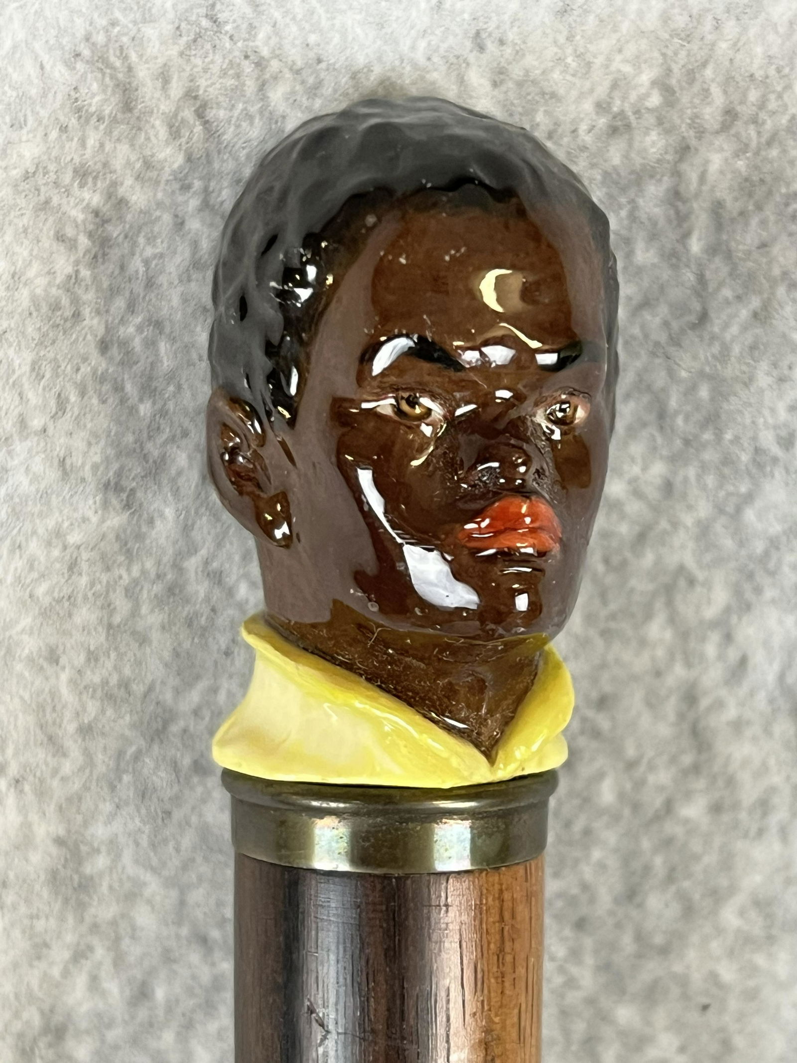 Antique Meissen Porcelain Handled Cane With Handle Of A Black Man: Antique cane / walking stick with a Meissen porcelain handle in the form of a bust of a black man . The bust is marked with the crossed swords mark on the underside of its base (see photo). The shaft