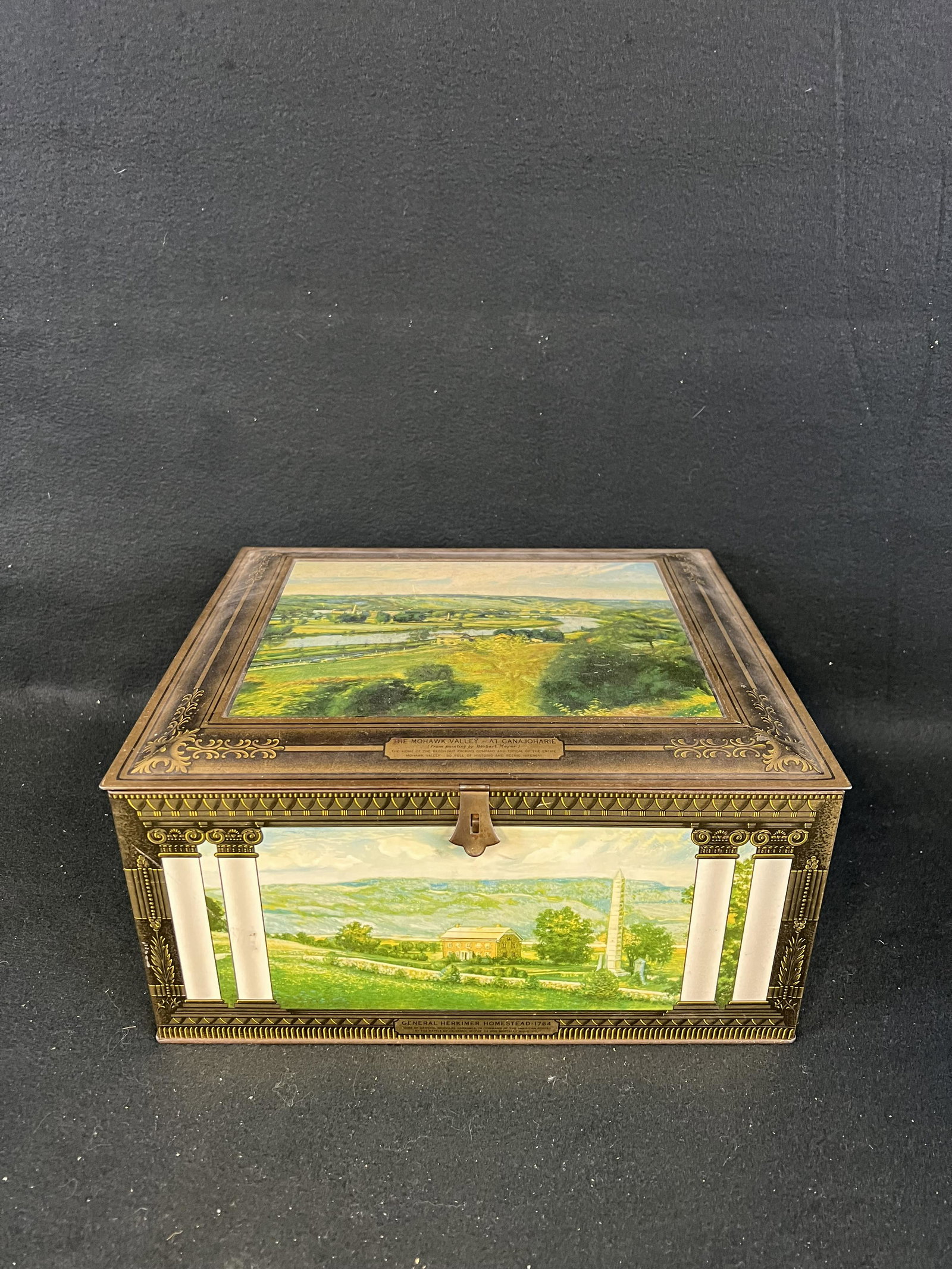 Antique Beech-Nut Packing Co "Mohawk Valley" Advertising Tin: An original antique lithographed tin advertising container depicting the Mohawk Valley At Canajoharie which was put out by the Beech-Nut Packing Company. Tin is in very nice all original condition.