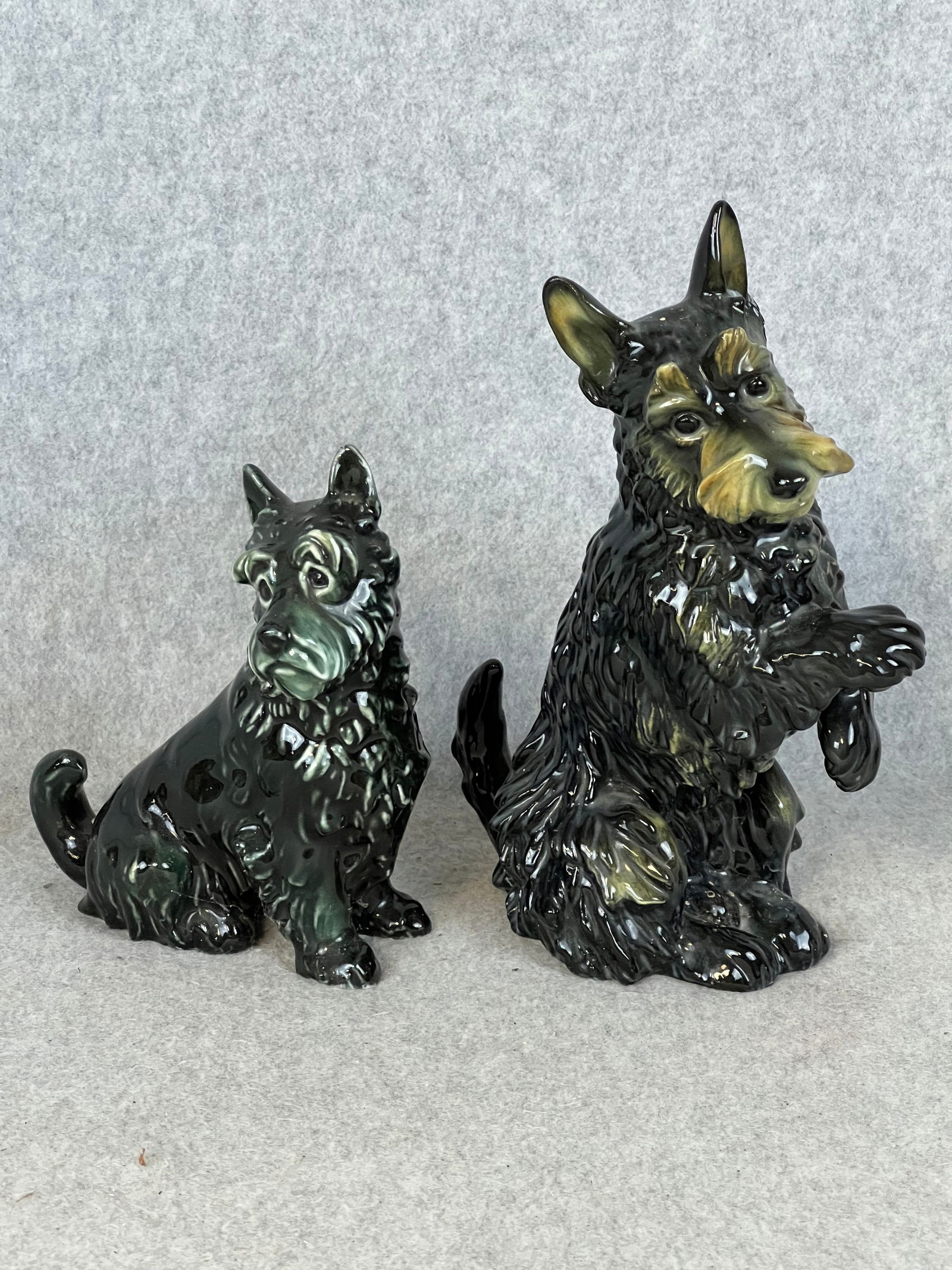 Lot 2 Karl Ens Volkstedt Porcelain Scottie Dog Figurines: Lot Of 2 Vintage Fine Porcelain Karl Ens Volkstedt Porcelain figurines of Scottie Dogs the largest of which measures approximately 8 1/4" tall and both are in excellent condition.
