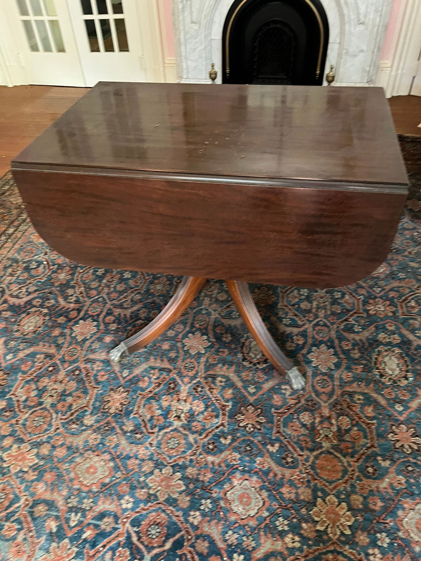 Duncan Phyfe Style Mahogany Table: Vintage Duncan Phyfe style one draw mahogany drop leaf table which measures approximately 38 3/4" W x 25" D x 30.75" H with each leaf measuring approximately 12 1/4" tall. Condition - fine.