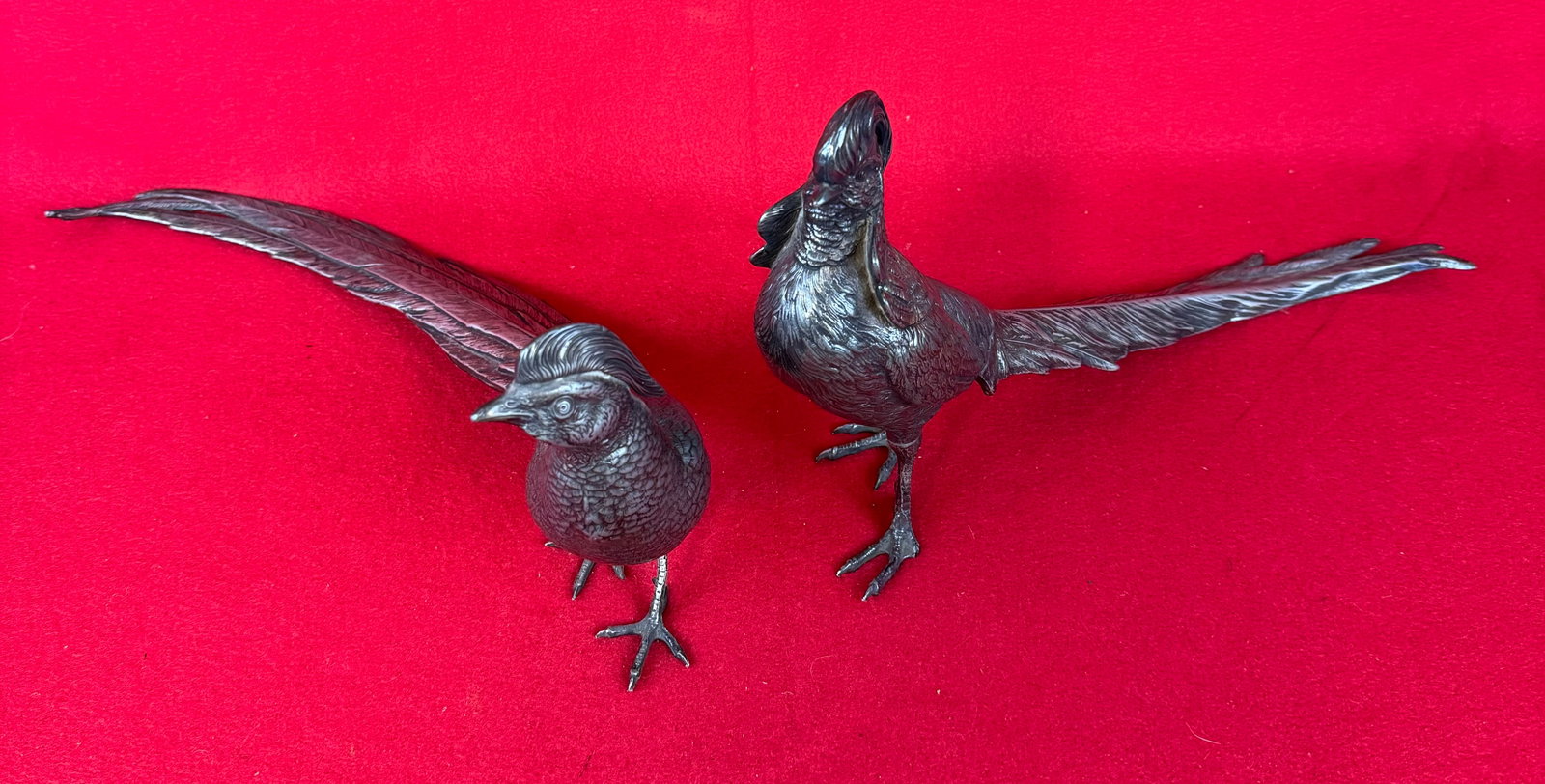 Pair Antique Jennings Brothers Silverplated Table Pheasants: Pair (male and female) of antique late 19th to very early 20th century silverplated table pheasants which were made and are marked by Jenning Brothers (JB) on the underside of the tails at their base.