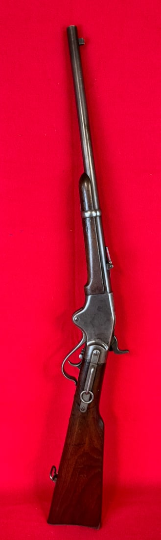 Model 1865 Spencer Carbine: Model 1865 Spencer saddle ring Carbine made by the Spencer Repeating Rifle Company with walnut stock and marked with a G.G.S. proof mark on barrel. The carbine is serial number 17335 and has inspector