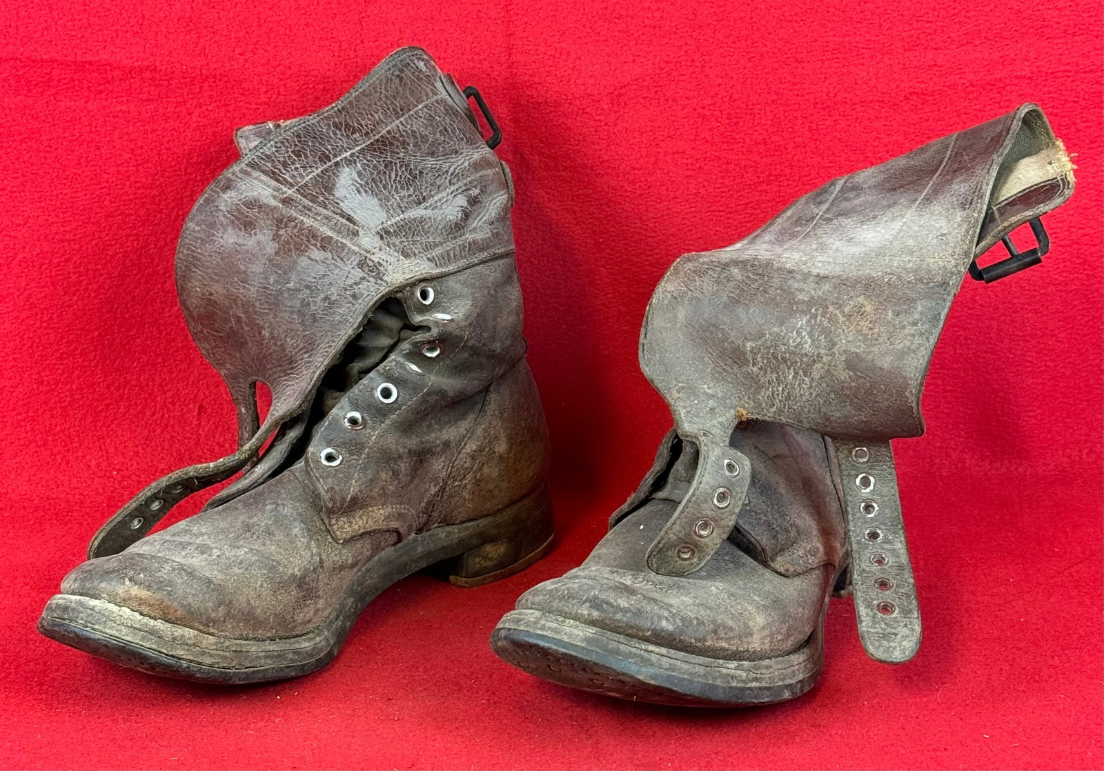 WW2 US Army Double Buckle Combat Boots: World War Two United States Army double buckle combat boots which are personalized to a Charles Austin whose name is written in ink on the interior of the boots. Boots are made of brown leather and ha