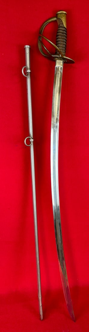 D. J. Millard Model 1860 Cavalry Sabre Dated 1862: Model 1860 Cavalry Sabre which was made by D. J. Millard Clayville New York. Sabre measures approximately 44" in total length with a 35" blade and has a brass guard with leather with wire wrapped wood