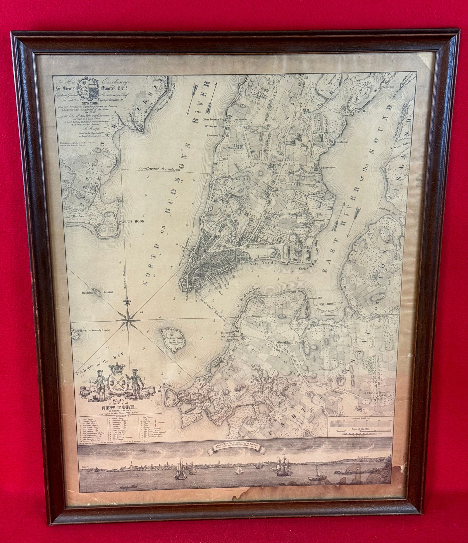19th C Reprint Of 1767 Map Of New York City: 19th century framed reprint of the 1767 Sir Henry Moore print of the map of the City Of New York. Framed map measures approximately 25" by 20" overall. Condition - some staining at the bottom edge as