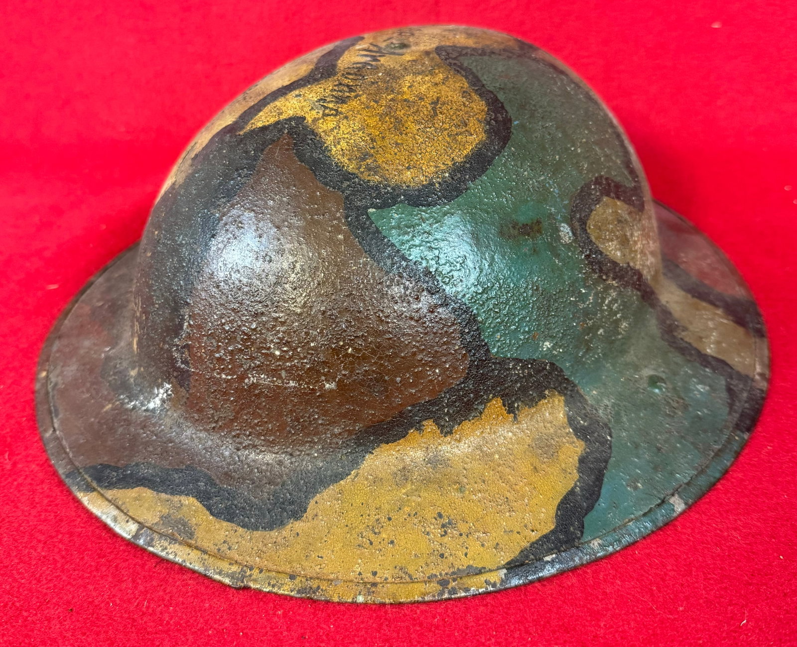 WW1 Doughboy Style Camouflage Helmet / Meuse Argonne Souvenir: World War One doughboy style camouflage helmet with souvenir inscription on the crown apparently from its use in the Meuse Argonne offensive at the close of World War One. Helmet comes complete with i