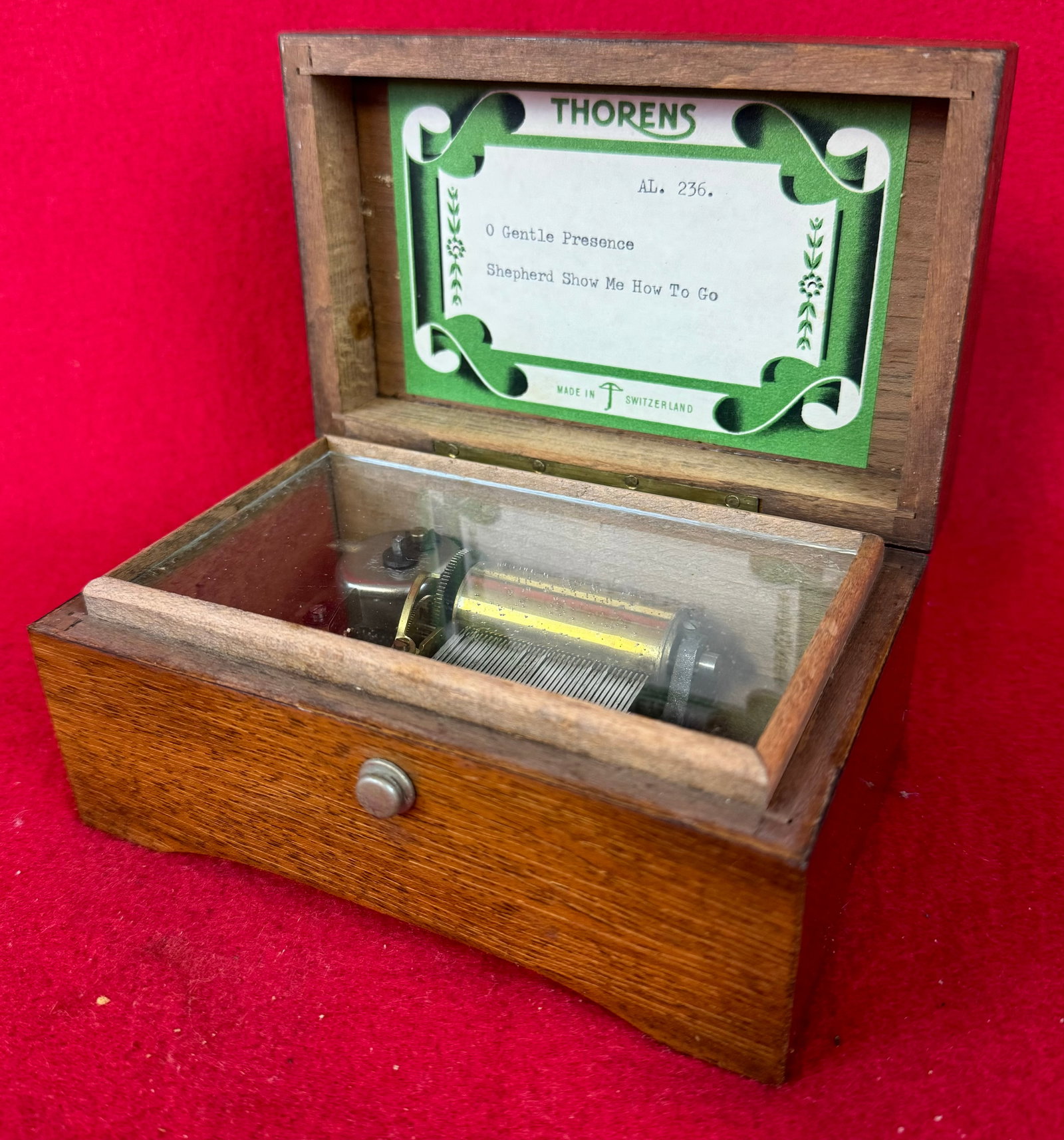 Vintage Thorens 2 Tune Music Box: Vintage Thorens two tune music box which was made in Switzerland. Music box case is made of walnut and measures approximately 5 1/2" by 3 1/2" and is 2 1/2" tall . Music box plays two tunes; O Gentle