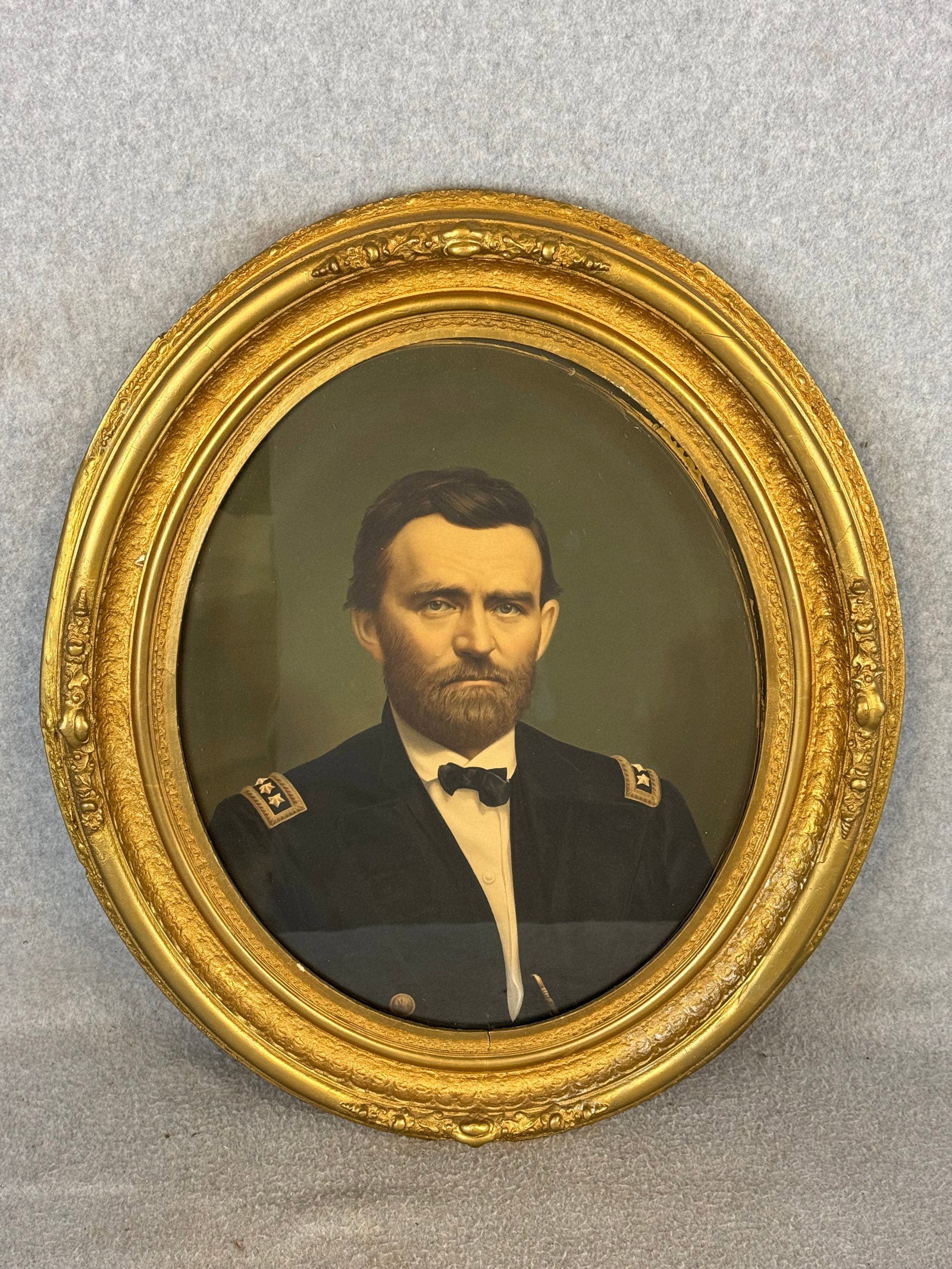 1866 Framed Chromolithograph Of U.S. Grant: An original patented 1866 chromolithogriaph of Ulysses S. Grant in his Civil War General's uniform by E. C. Middleton & Co Cincinnati Ohio in a period gesso over wood oval frame which measures approxi