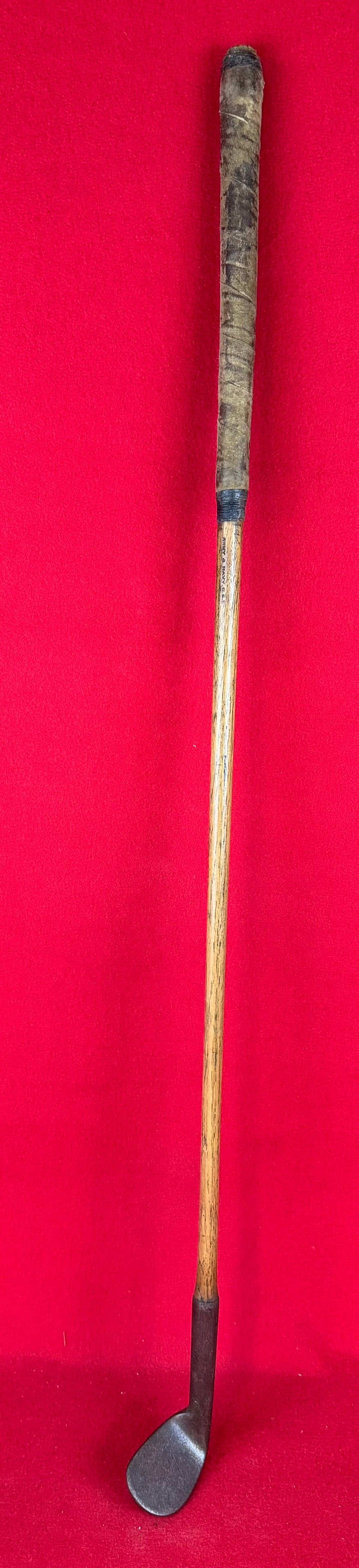 Antique C 1890 Army & Navy Stores London Rut Iron: Antique circa 1890's Army and Navy Stores London rut niblick / rutter / track iron which has faint markings A & N etc. and is also marked Army & Navy on its hickory shaft. Club has a brown leather wra