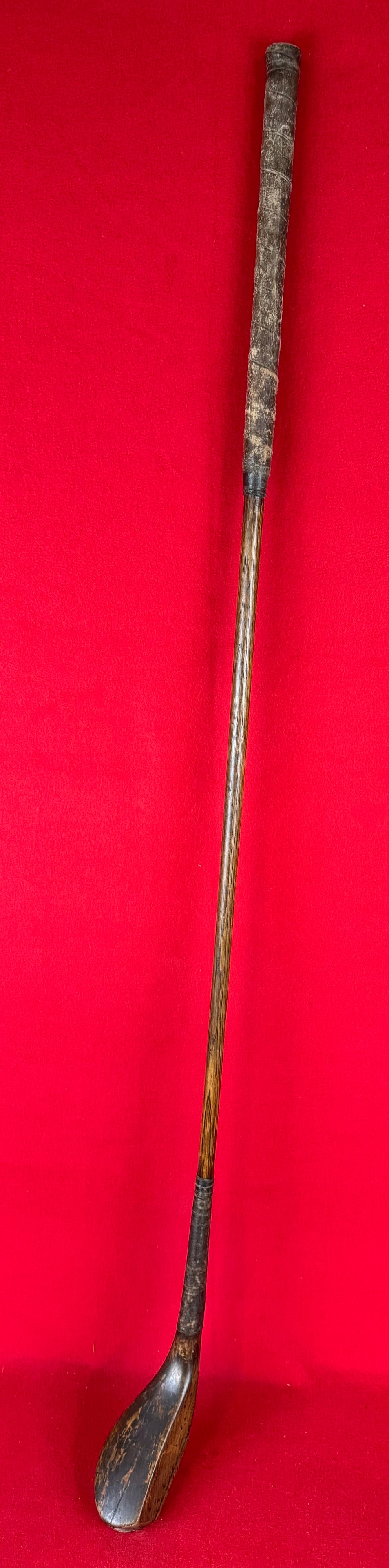 Antique 19th C Long Nose Spoon: Antique 19th century long nose spoon golf club with what appears to be its original hickory shaft and leather wrapped grip. Club has a horn sole plate and a lead filled back. Condition - is as shown.