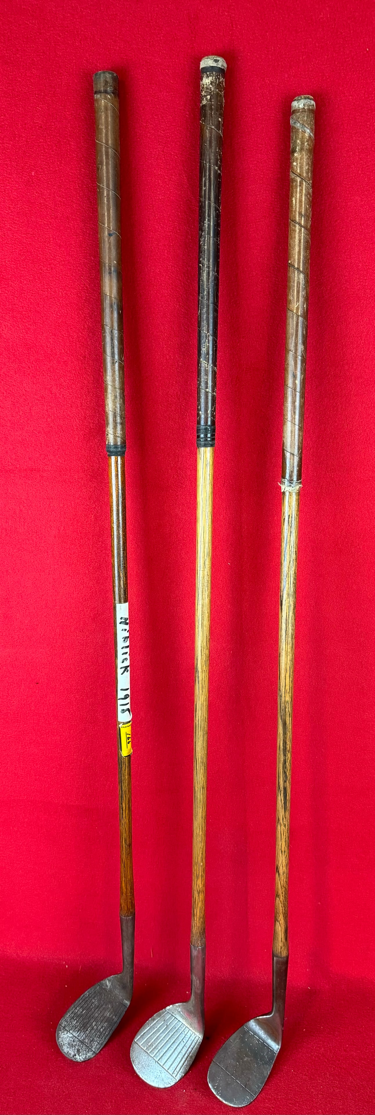 Lot 3 Antique Hickory Shafted Niblick Golf Clubs: Lot of three antique hickory shafted Niblick golf clubs to include a Falcon, Harry Lee & Co NY Maxim and a Special Dreadnaught Niblick all with leather wrapped grips. Condition - is as shown.