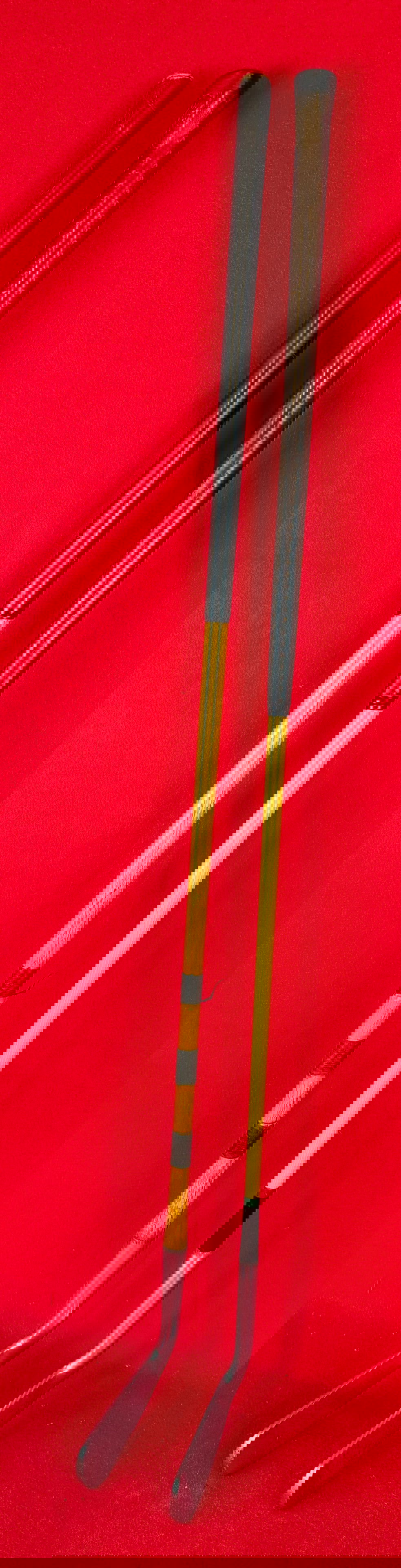 Lot 2 Spaulding Kro-Flite Calamity Jane Bobby Jones Putters: Lot of two vintage Spaulding Kro-Flite Bobby Jones putter one being a hickory shaft specimen with leather wrapped grip and the other with a coated steel shaft with perforated leather grip. The hickory