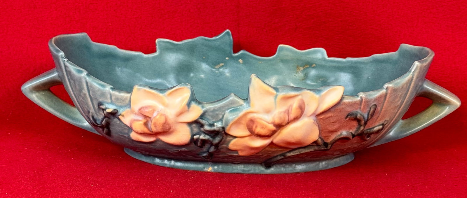 Roseville Blue Magnolia 449-10" Console Bowl: Original Roseville 449-10" console bowl in the Magnolia pattern which dates to 1943. Console bowl is marked on underside of the base in relief Roseville / U.S.A. / 449-10" and is in the blue coloratio