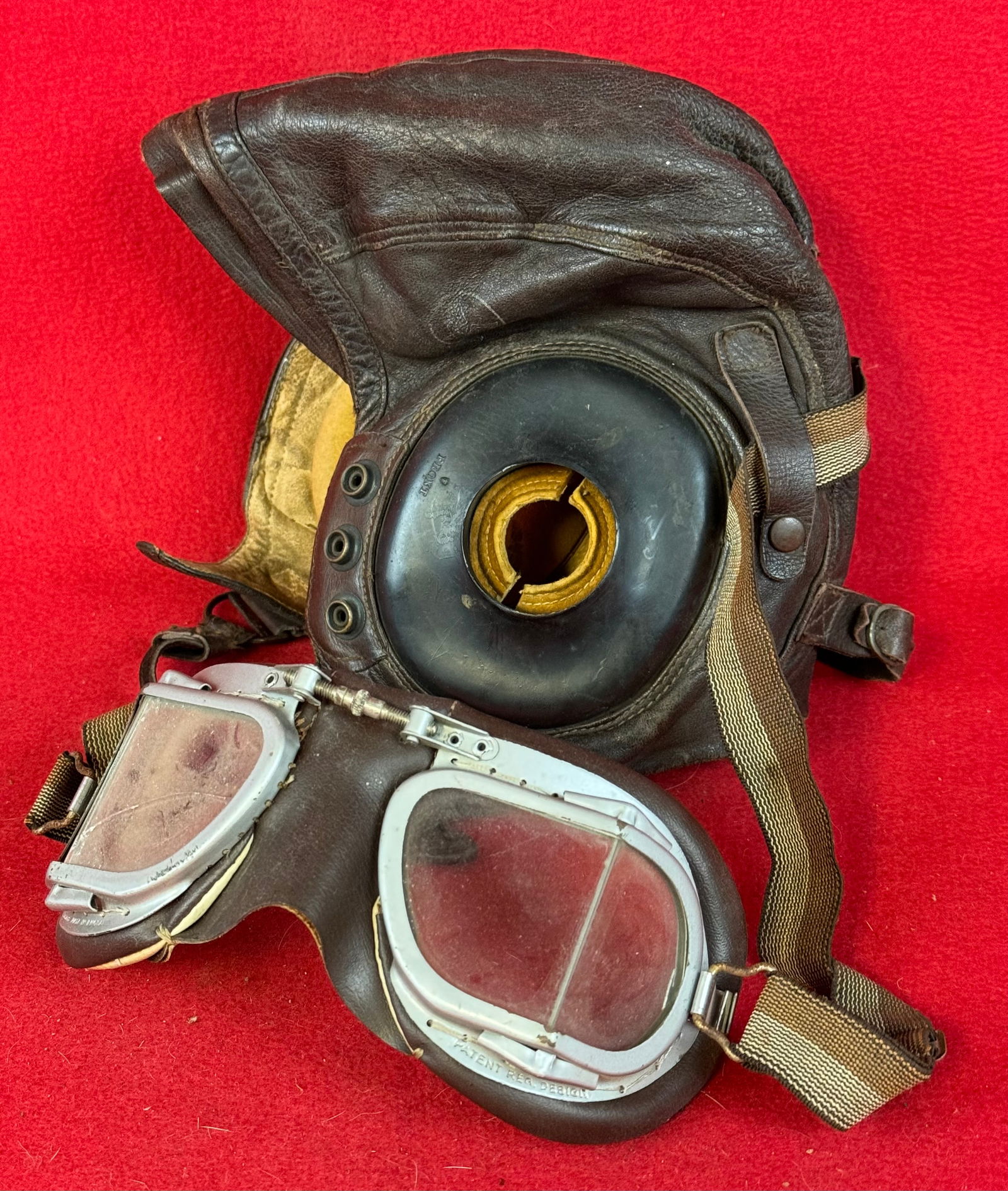WW2 US Army Air Force Type A-11 Pilots Helmet With Goggles: World War Two United States Army Air Force Leather Type A-11 pilots flight helmet along with a Stadium Made In England goggles. Pilots flight helmet is in fine condition . Goggles have a crack to one
