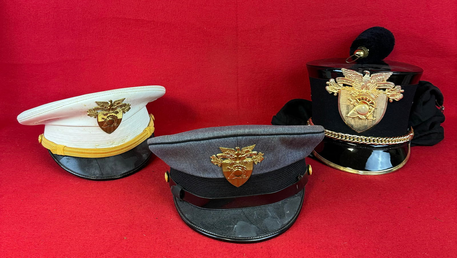 Lot 3 Vintage The Military Academy at West Point Visor Caps & Shako: Lot of 3 Military Academy At West Point visor caps and a shako with metal insignia at front. Condition - mostly fine as shown and shako comes with its original cloth bag.