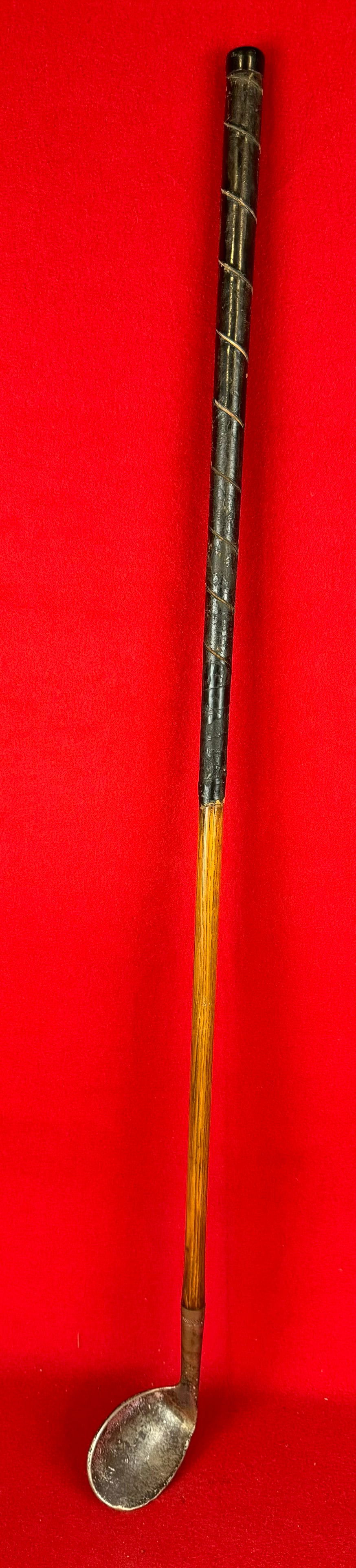 1920's Walter Hagen Hickory Shafted Concave Sand Wedge: Antique circa 1920's Walter Hagen hickory shafted concave sand wedge golf club with a leather wrapped grip. Condition - is as shown.