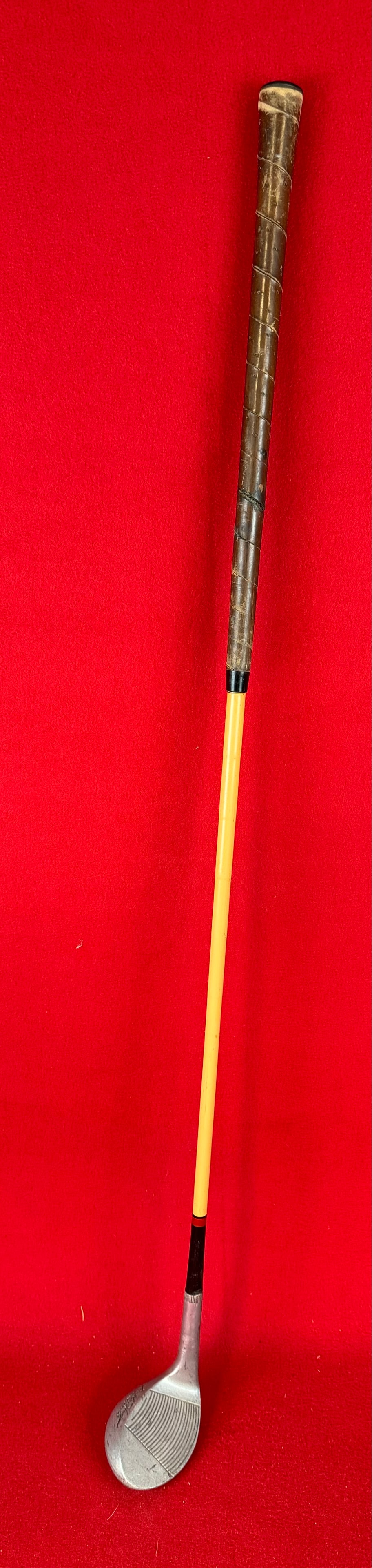 1930's Walter Hagen Sandy Andy Sand Wedge Golf Club: 1930's Walter Hagen Sandy Andy Sand Wedge Golf Club with a covered steel shaft and having a leather wrapped grip.