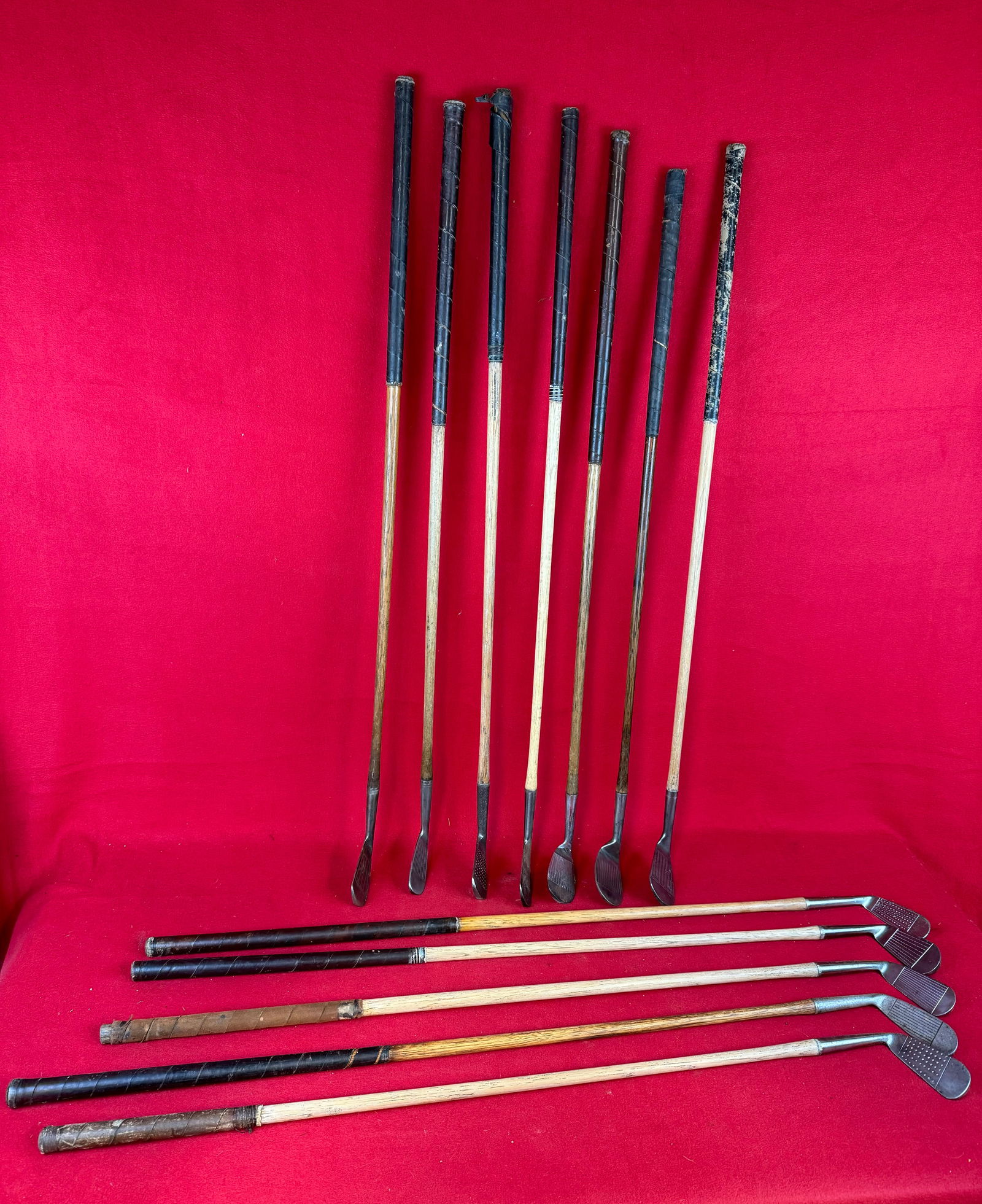 Lot 12 Antique Hickory Shafted Golf Clubs & Vintage Golf Bag: Lot of twelve antique hickory shafted golf clubs and a vintage golf bag. Clubs include various cleek marks as shown in the photos. Condition - is as shown.