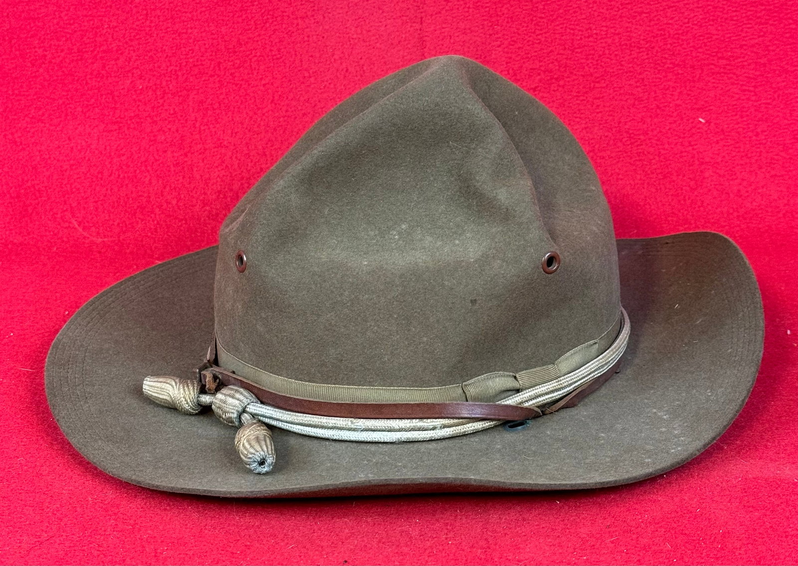 WW2 Stetson US Drill Sergeant Hat: World War Two United States Army drill sergeant green felt hat which was made by John B Stetson & Co. Hat is in fine condition with its original hat cord and just some minor soil and wear.