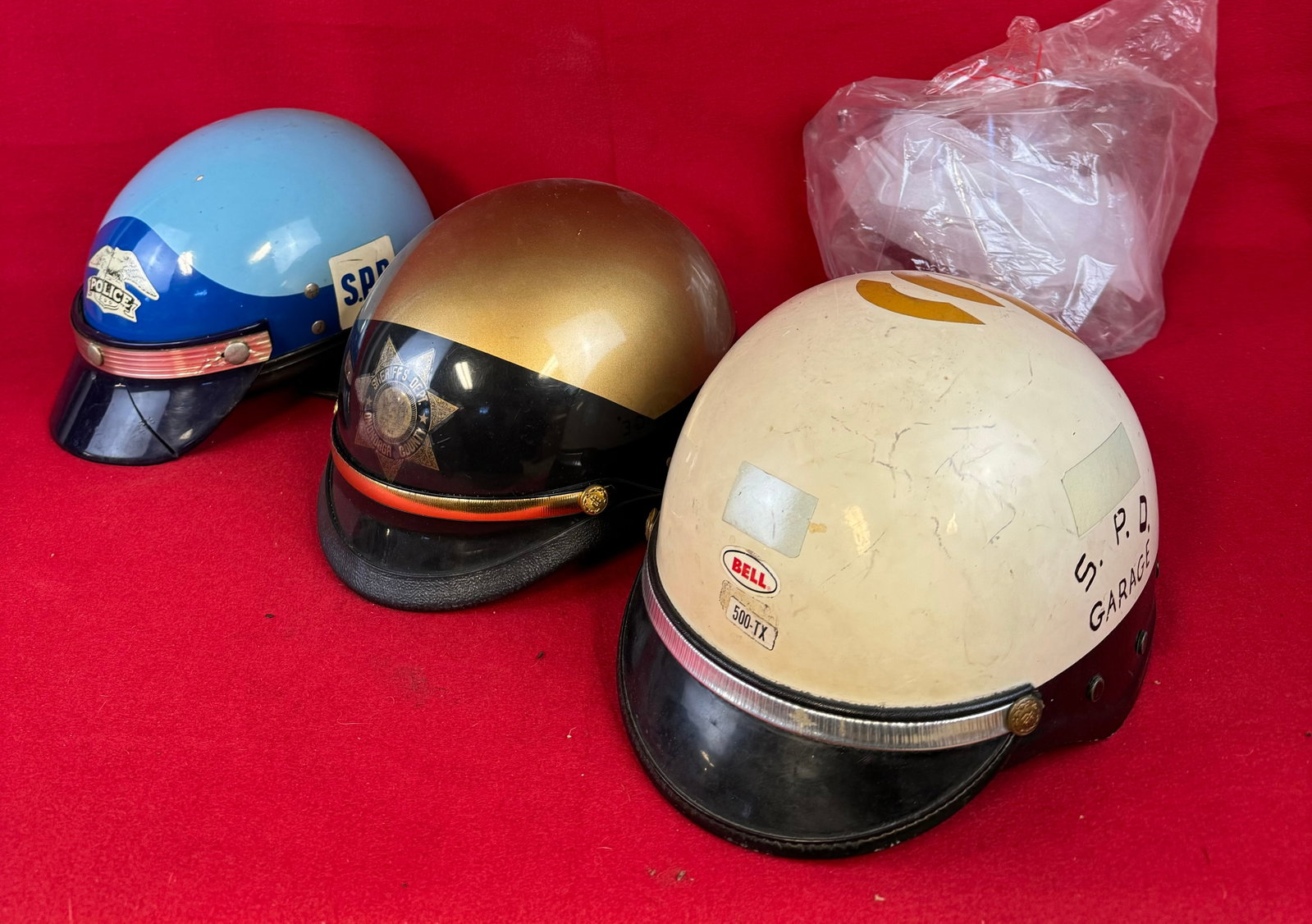Lot 3 Syracuse Police Department Helmets: Lot of three vintage Syracuse Police Department helmets. Condition - is as shown.