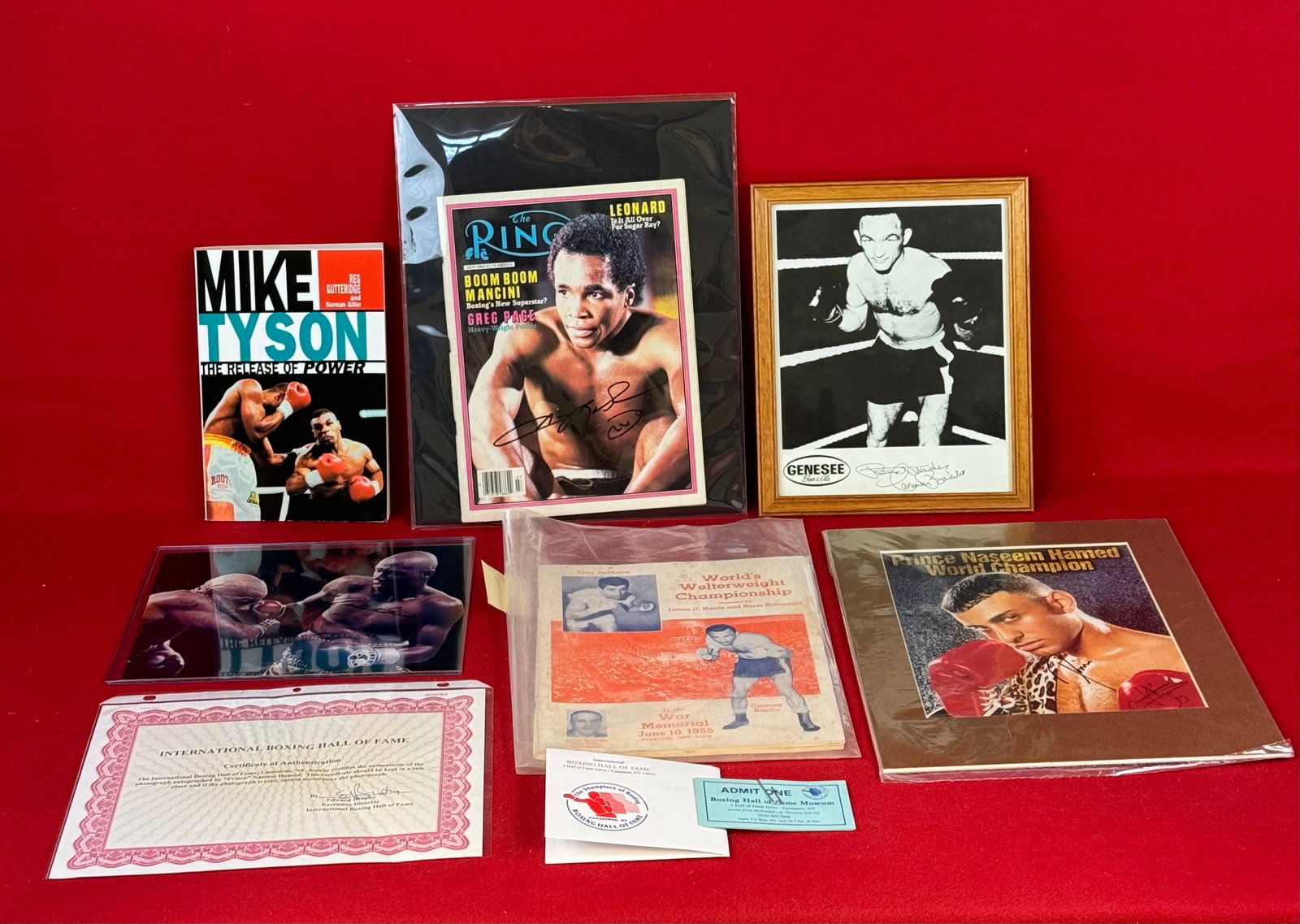 Lot Boxing Related Items Including Autographed Photos, Program etc.: Lot of boxing related items to include a 8x10 framed photo signed by Carmen Basilio; Ring Magazine signed by Sugar Ray Leonard with Boxing Hall Of Fame COA, Antonio Tarver signed photograph with COA b