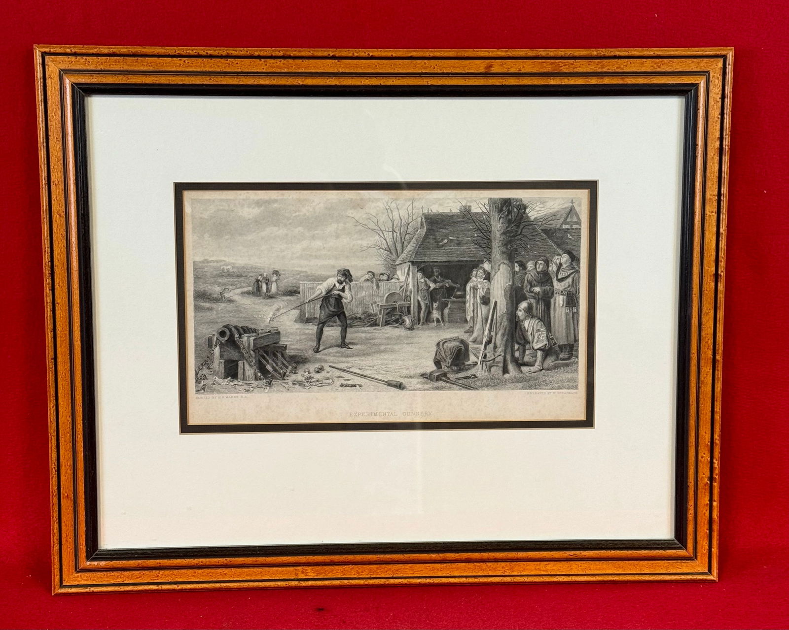 Framed Antique Print Titled "Experimental Gunnery" After H. S. Marks: Antique framed print titled "Experimental Gunnery" after the artwork by H. S. Marks and engraved by W. Greatbach. Print has been professionally matted and framed and the birdeye frame measures approxi