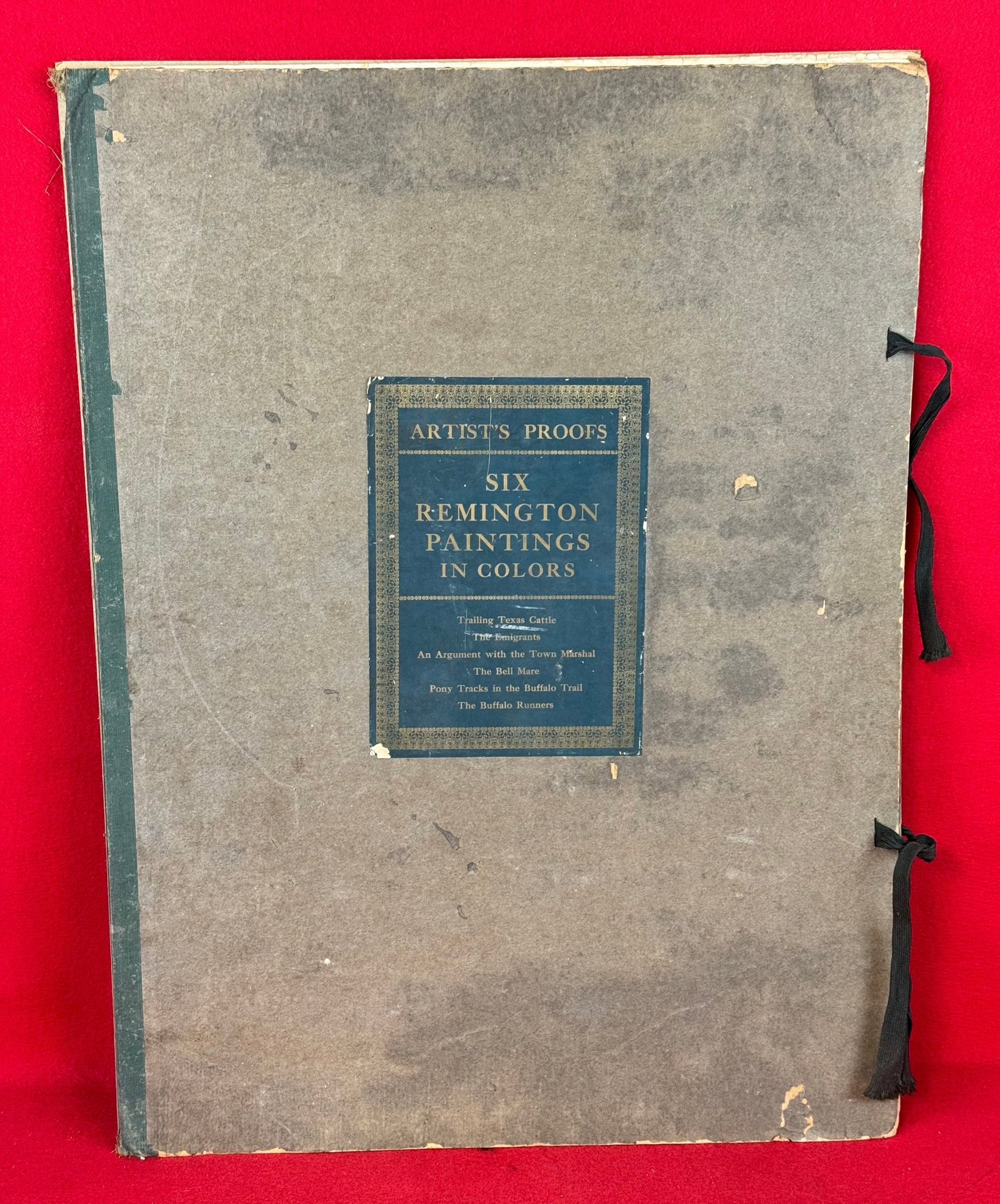 1908 Lg Folio Frederick Remington Prints: Large folio of Frederick Remington western theme color lithographed prints. Folio has only five of the original six prints and the prints each measure approximately 23 1/2" by 17 1/2". Condition as sh