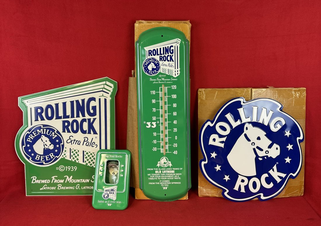 Lot 4 Rolling Rock Beer Advertising Items: Lot of 4 Rolling Rock Beer advertising items which includes a thermometer in the box, two tin signs one of which is in the box and a bottle opener. Condition - all items like new.