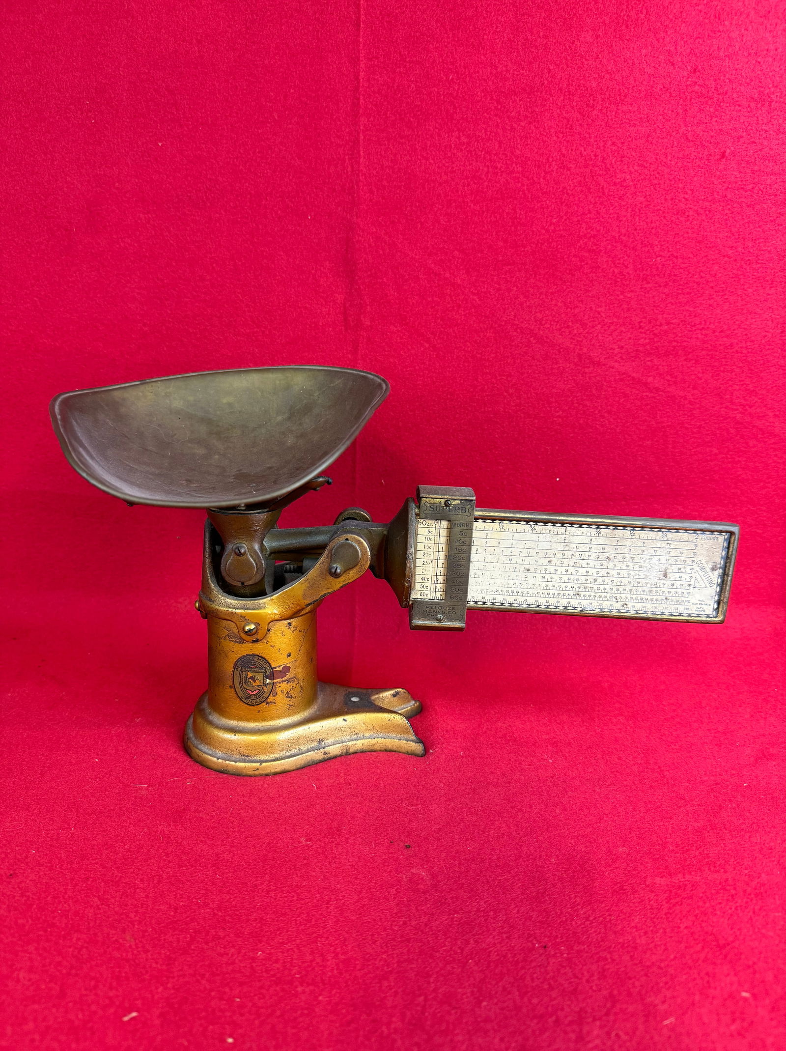 Antique Pelouze Mfg. Co Country Store Candy Scale: Antique patented 1915 country store candy scale which was made by the Pelouze Manufacturing Company Chicago. Scale is cast iron with cardboard scale and having a brass pan. Scale has is original worn