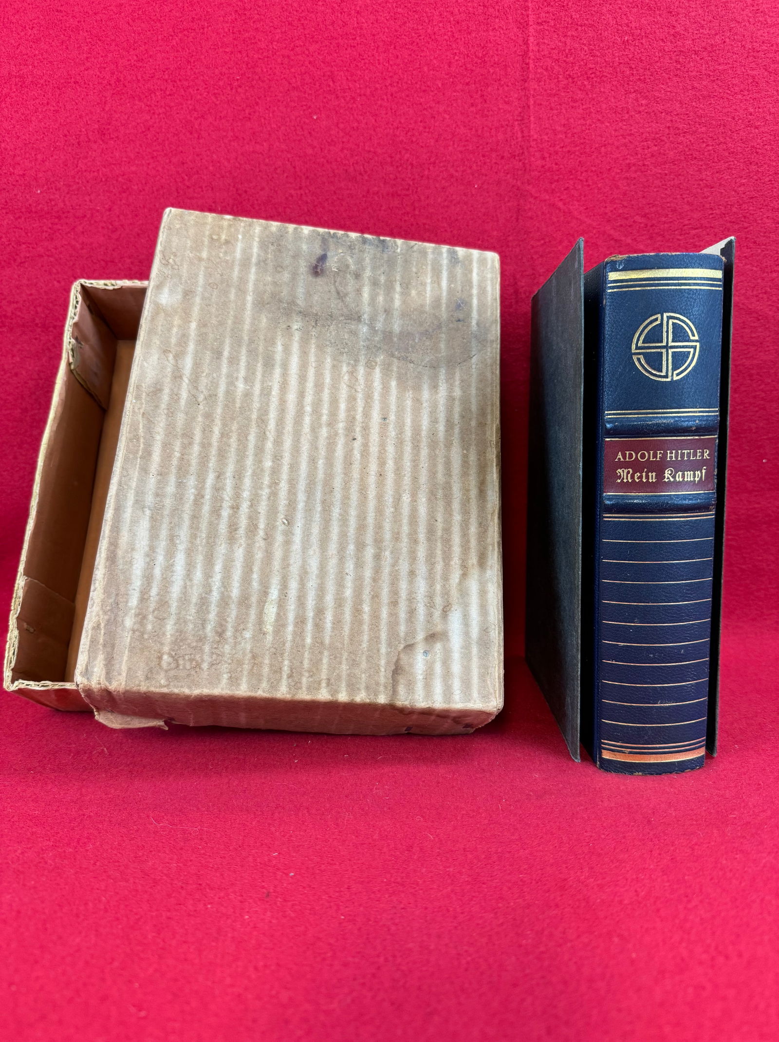 39 Edition Mein Kampf By Adolf Hitler & Orig Box: An original 1939 edition of Mein Kampf by Adolf Hitler bound in dark blue leather with gold lettering. Book comes with its original partial slip case and with what appears to be its original cardboard