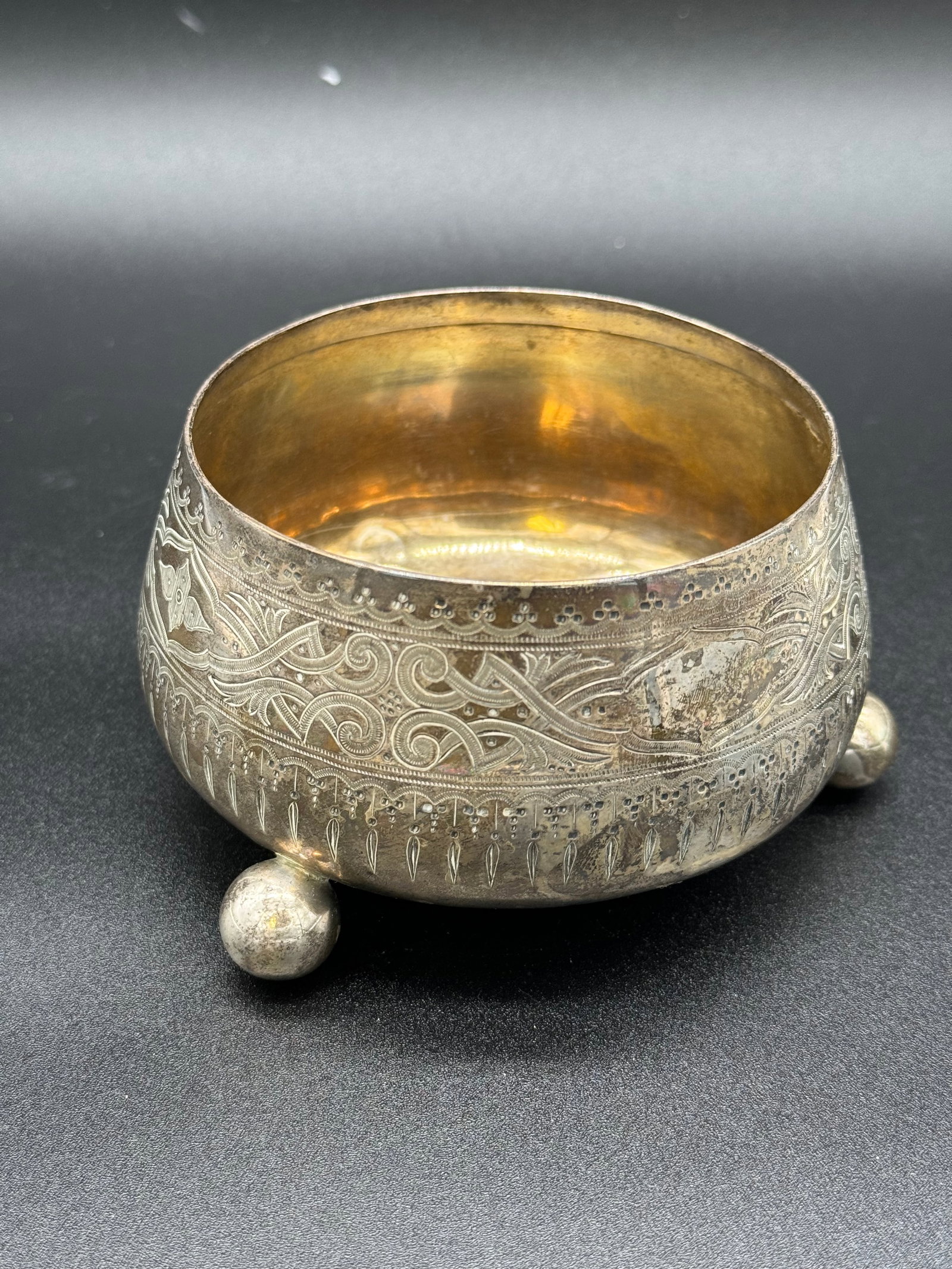 T. J. Paris Sterling Silver Footed Bowl: Antique circa 1870's marked sterling silver footed bowl by T. J. Paris Liverpool. The bowl has a band of Moorish style engraving about its mid section and is supported on three ball form feet. The bow