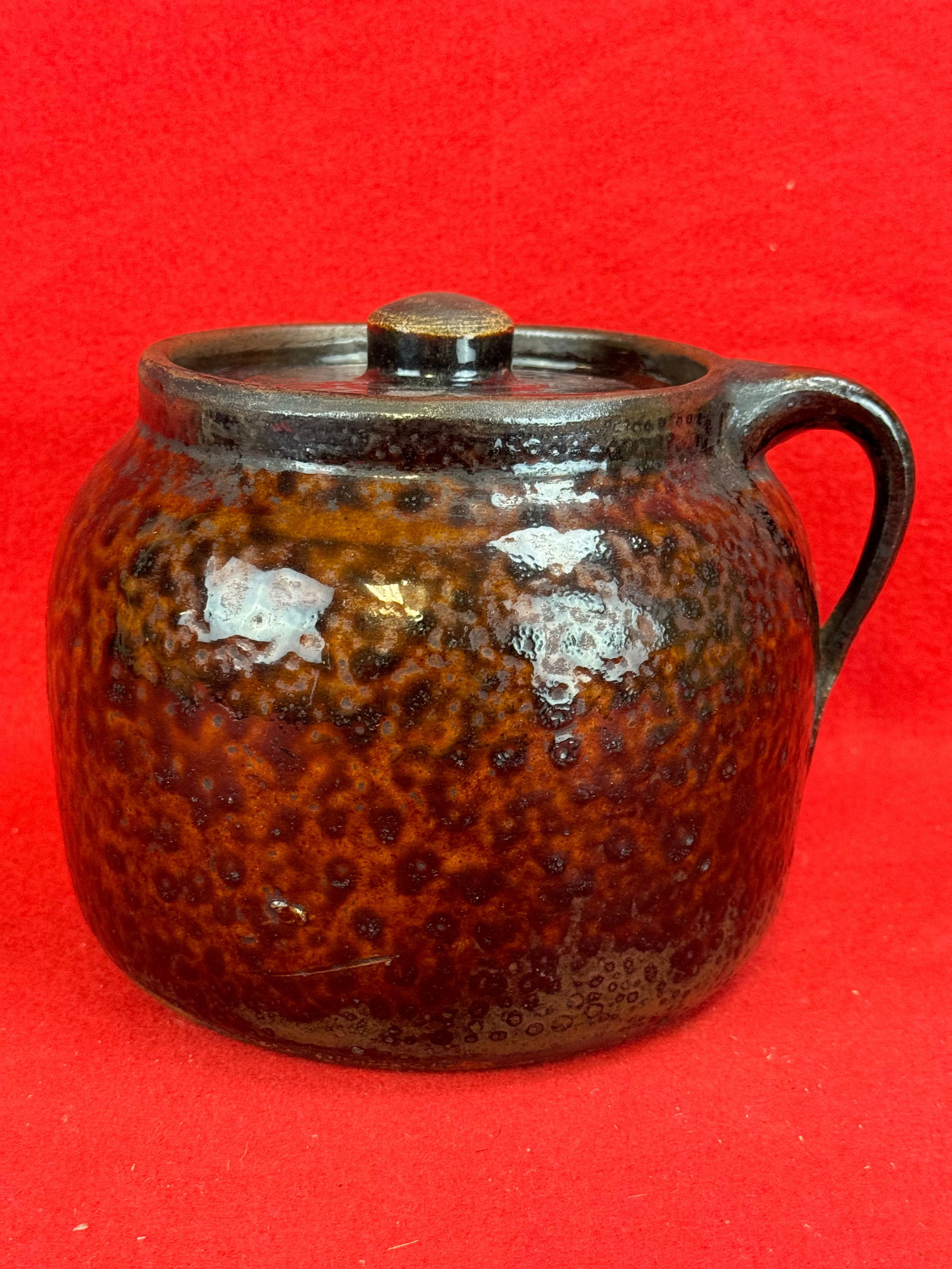 Antique Pottery Handled Bean Pot w/ Mottled Glaze: Antique pottery (stoneware) handled bean pot with cover which has a wonderful mottled glaze. Pot measures approximately 6" tall and is 6 1/2" in diameter. Condition - bean pot is excellent being free