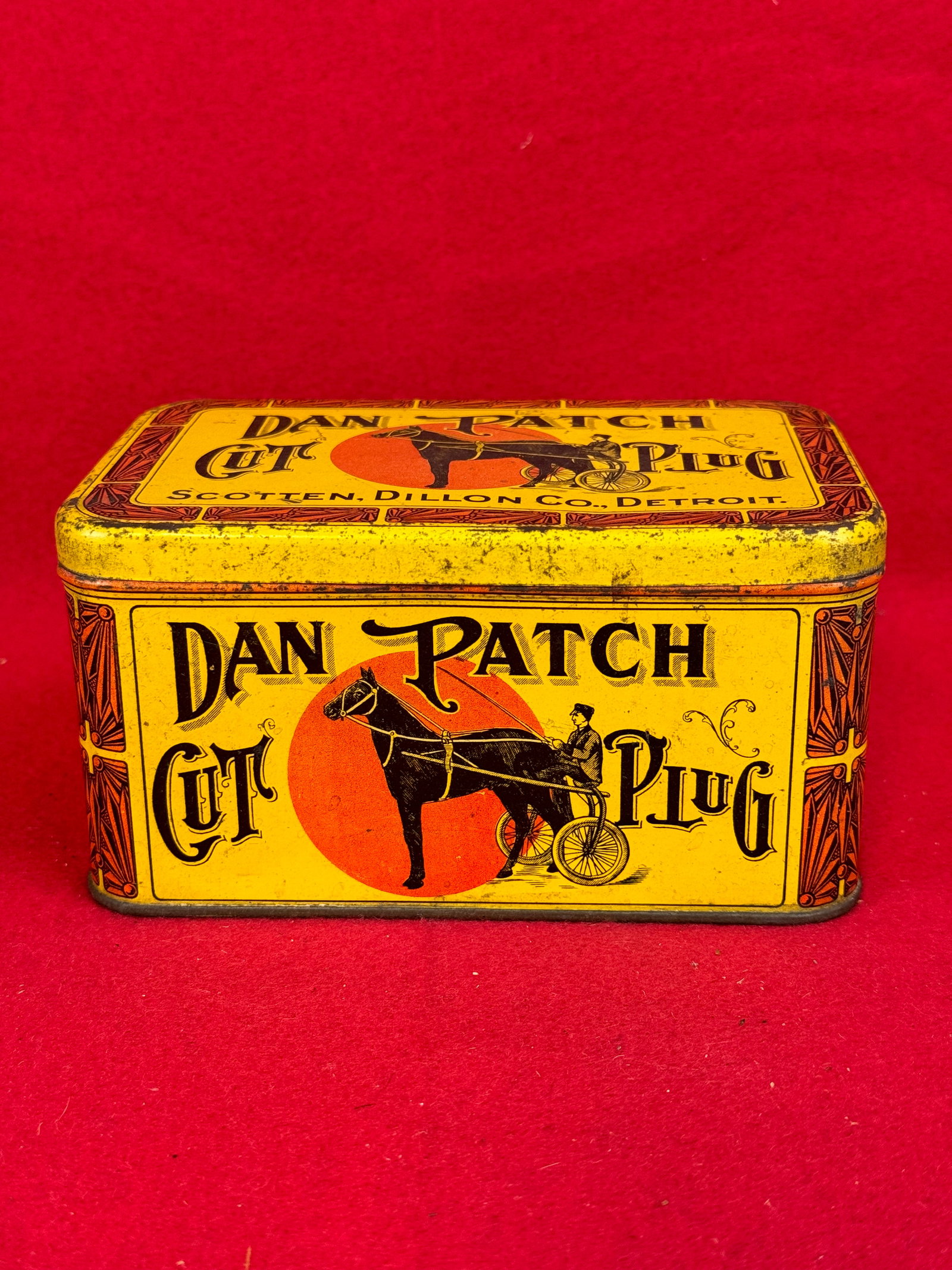 Antique Dan Patch Cut Plug Tobacco Tin: Antique circa 1900 Dan patch Cut Plug Tobacco Tin featuring a depiction of this record setting trotting horse with rider. Tin is in nice condition with strong colors just some wear and spotting mostly