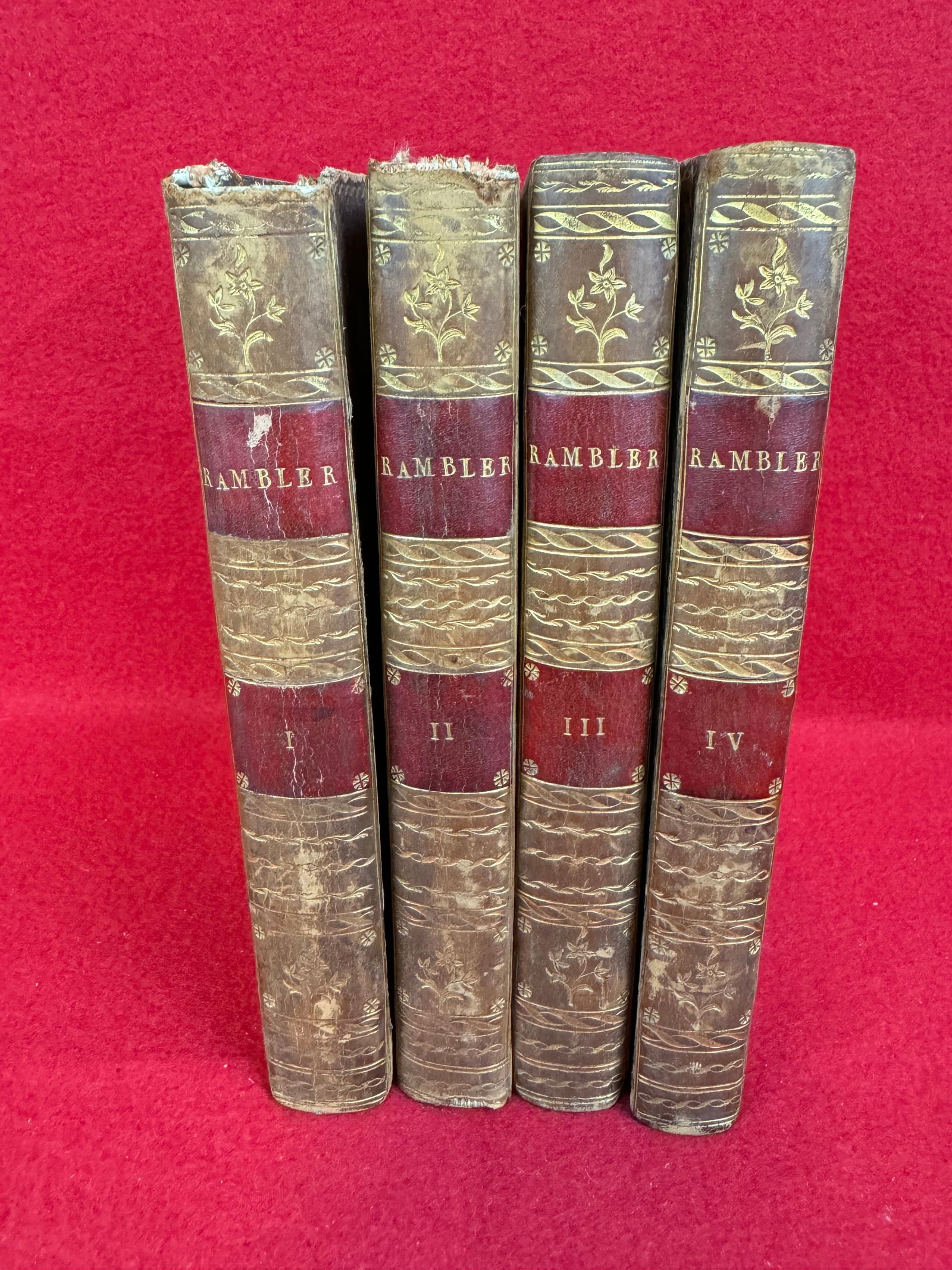 Set Books- The Rambler Published In Dublin 1785: Four volume set of antique books titled "The rambler" printed in Dublin by D. Graisberry for Richard Moncrieffe in 1785 these being the 11th edition. Books are bound in full leather and each measures