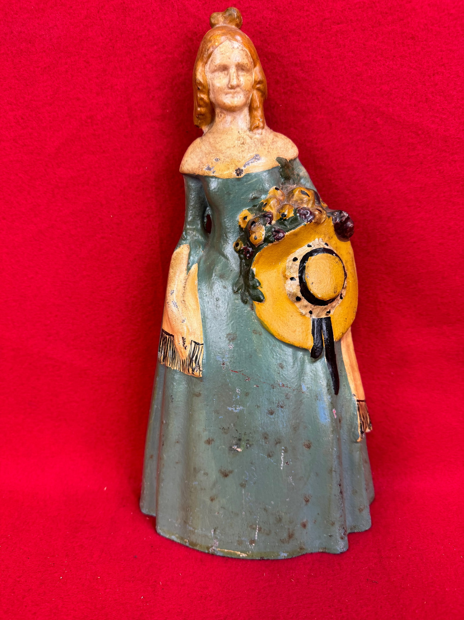 Southern Belle Cast Iron Doorstop: Original cast iron southern belle doorstop with its exceptional all original factory paint. Doorstop measures approximately 11 3/4" tall. . Doorstop is pictured on page 21 of the doorstop book by Bert