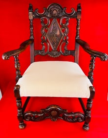 Antique Ornately Carved Armchair