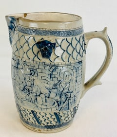 Lg Blue & White Molded Stoneware Pitcher