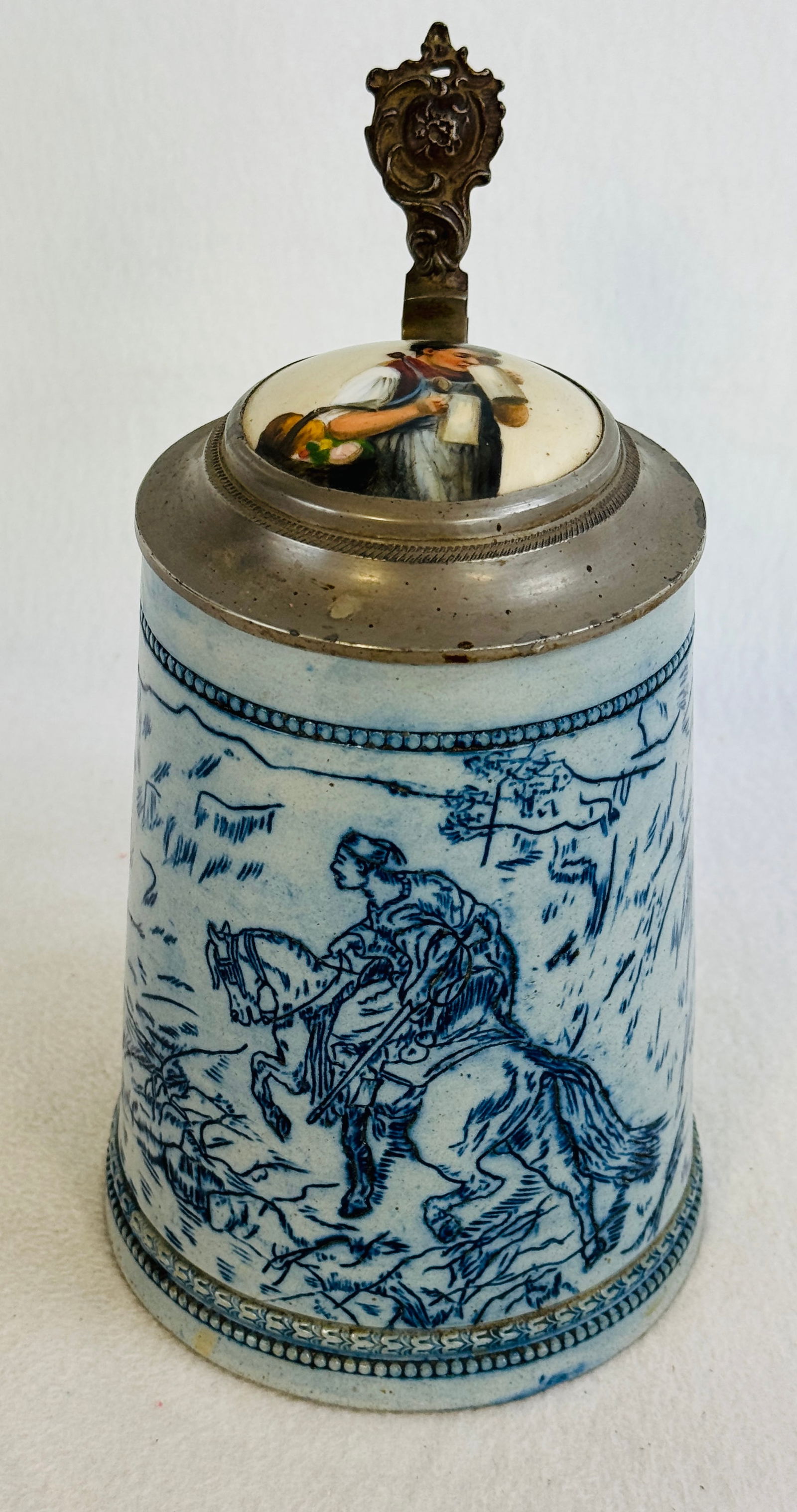 Etched Whites Pottery Utica NY Stein -Inlaid Lid: Scarce 9" (to top of thumb latch) etched decorated blue and white stoneware stein with a inlaid pewter lid which was made by the Whites Pottery Utica New York. Stein has a design of a Moroccan Man wit