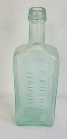 O.P. E Furman Manvill West Troy NY Hair Bottle