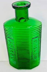 KI-1 Emerald Green Poison Bottle: 5 1/2" blown in mold with tooled top poison bottle identified in Kuhn as KI-1 in emerald green glass and having Poison embossed on the two side ribbed panels and Patent Appl For on the underside of th