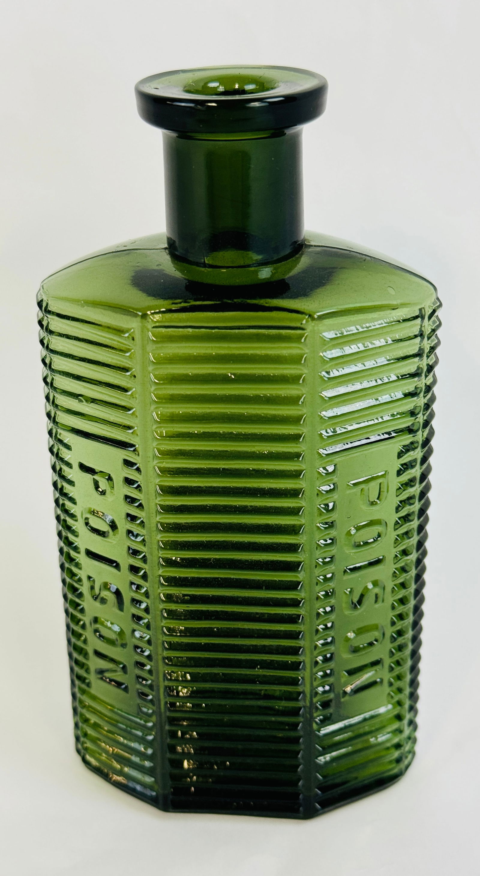 KI-2 Olive Green Poison Bottle 5 1/2": 5 1/2" blown in mold with tooled top olive green poison bottle which is identified in Kuhn as K1-2. Bottle is also embossed on the base by the maker Carr Lowry Glass Co as well as Patent Applied For.
