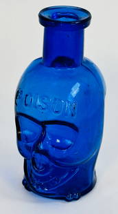 KU-10 Cobalt Figural Skull Poison 3 1/2": 3 1/2"" blown in mold with tooled top figural skull poison bottle which is identified in Kuhn as KU-10. Bottle is cobalt with the word POISON embossed on the forehead and Pat. Appl'd For on the rear n