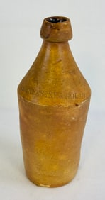 10 1/2" Hennessey & Nolan Stoneware Bottle