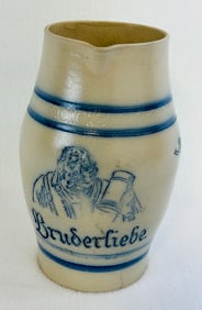 Blue & White Molded Stoneware Pitcher w Man w Stein